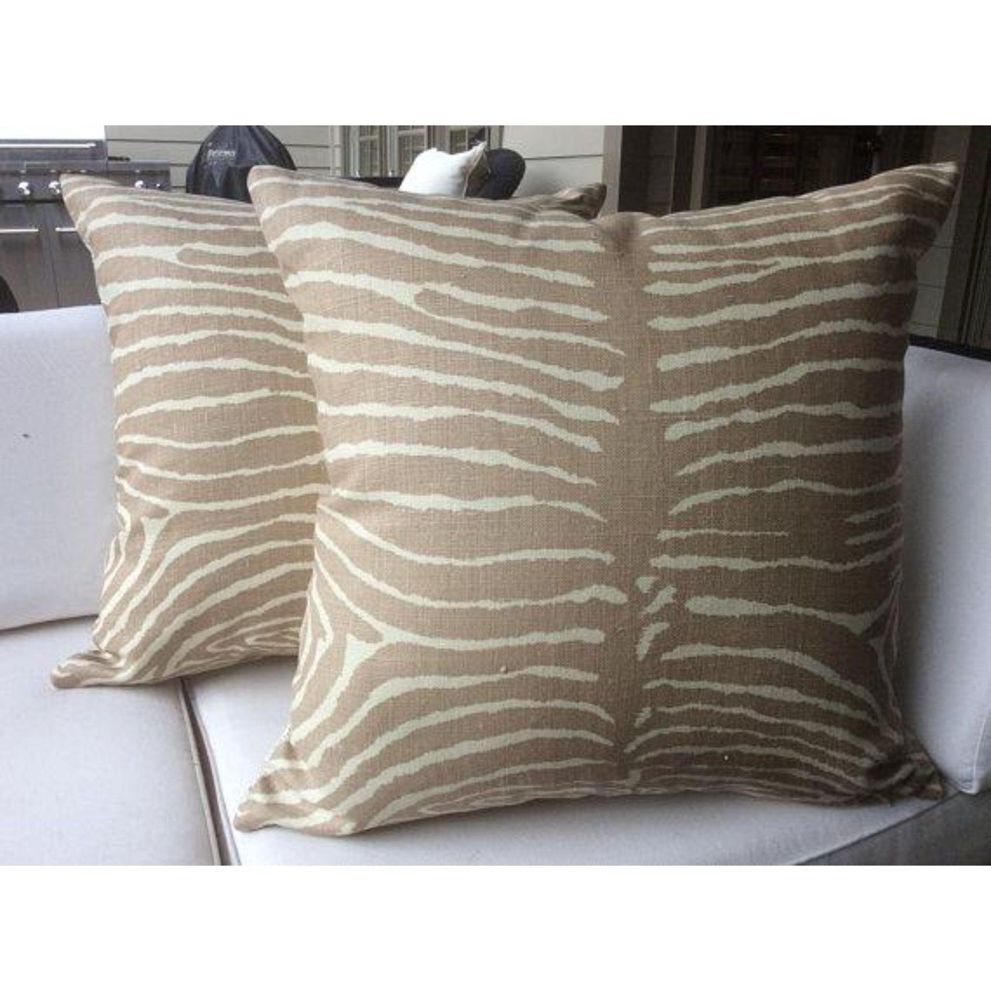 From Brunschwig and Fils comes this exotic zebra print in soft taupey tan and off white heavy linen fabric. My workroom has taken this and fashioned it into pillows, featuring coordinating linen backs and an invisible zippers.

The official colorway