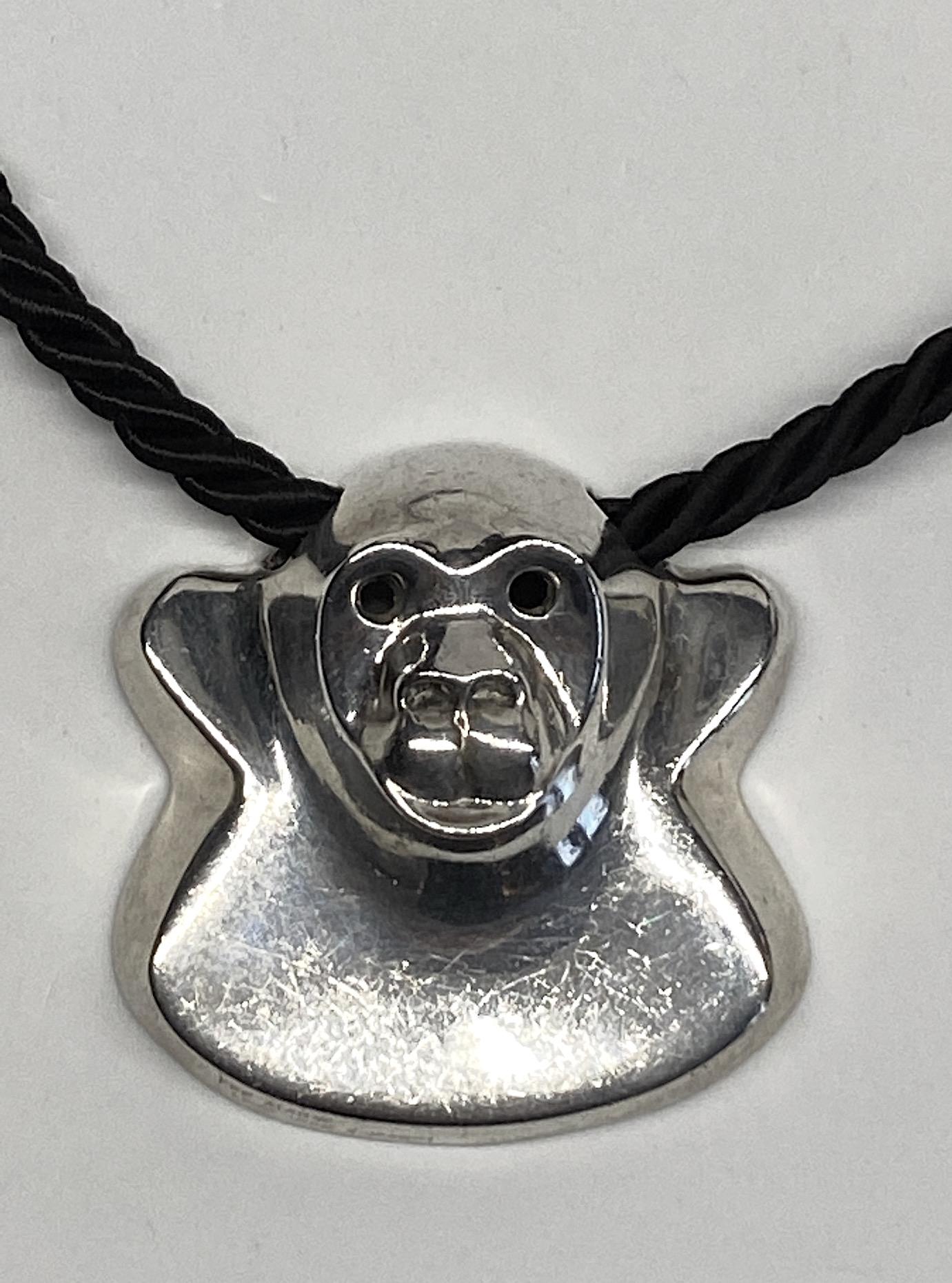 Modernist design sterling silver gorilla pendant part of the zoo series created by New York City jewelry design team Jack Brusca and Joseph Dante in 1976. The pendant is 2 inches wide, 2 inches high and .88 of an inch deep in cast sterling silver.