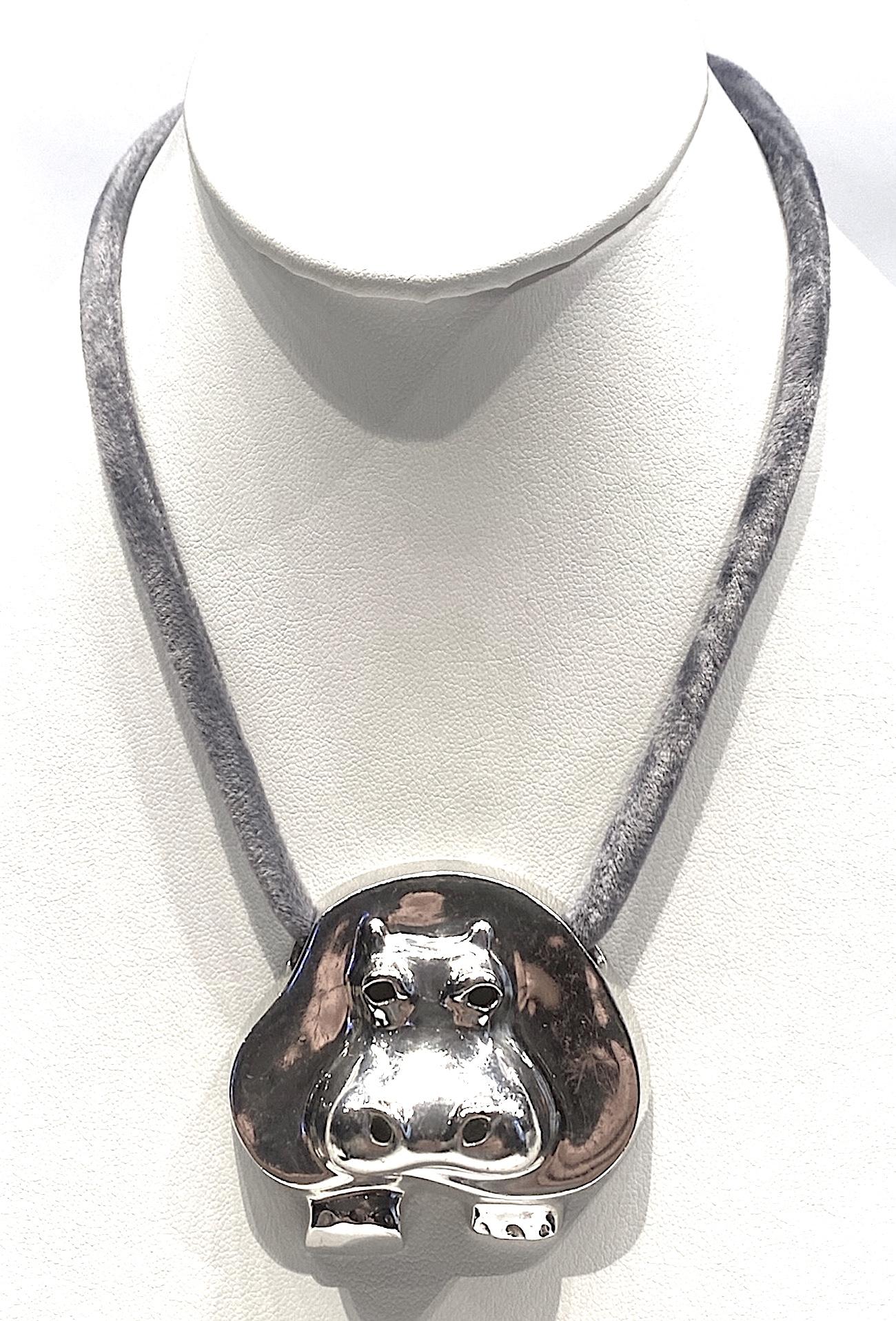 Modernist design sterling silver hippopotamus pendant by New York City jewelry design team Jack Brusca and Joseph Dante in 1975. The pendant is 2.25 inches wide, 2.13 inches high and .75 of an inch deep in cast sterling silver. It is shown on and
