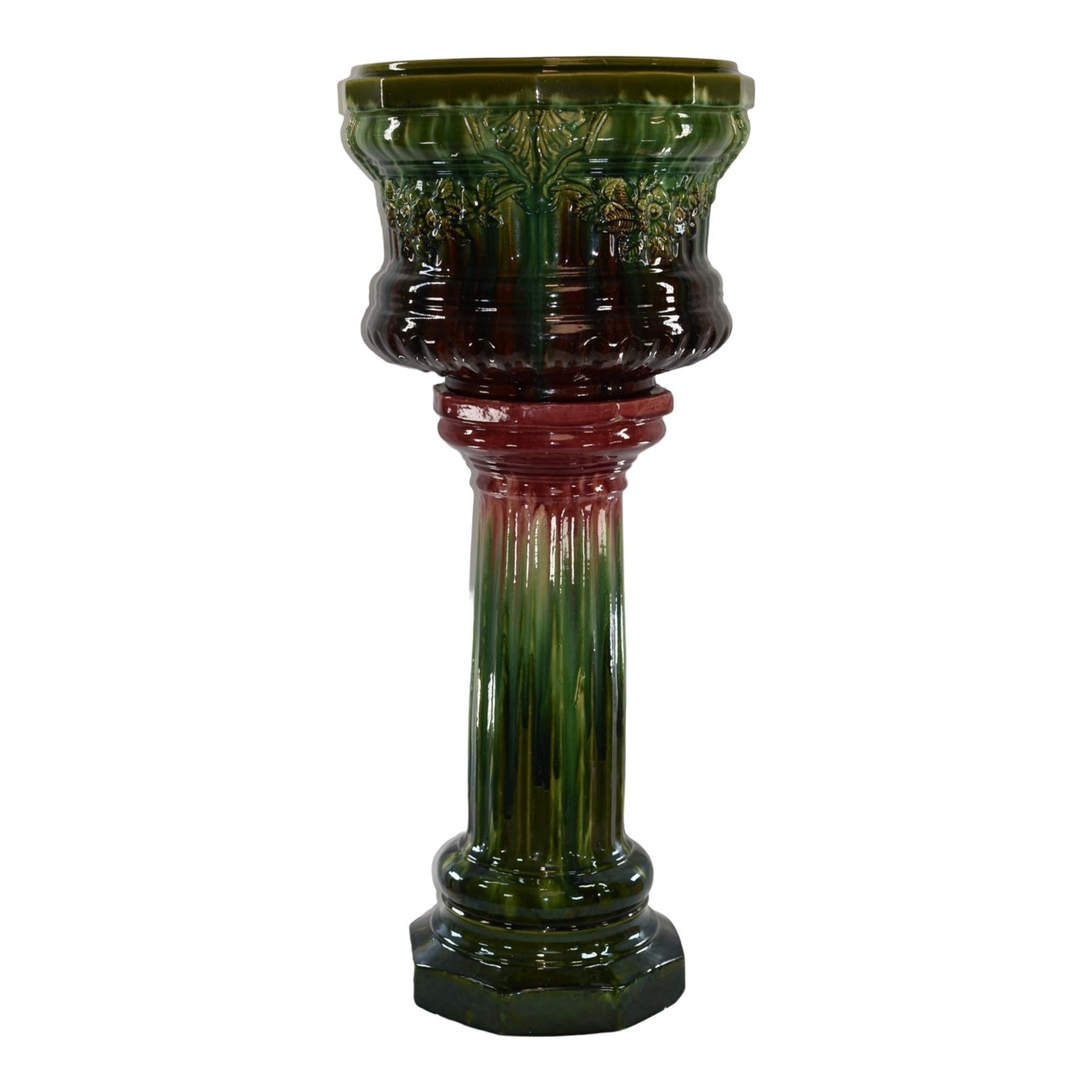 Brush McCoy Athenian 1928 Art Pottery Majolica Blended Jardiniere Pedestal 2540B
Massive and rarely seen Majolica blended glaze Athenian jardiniere and pedestal with great design, color and glaze.
Shows well with a pinky nail sized chip to rim and
