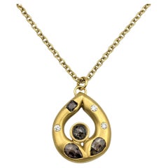 Brushed 18 Karat Gold Teardrop Pendant Necklace with Brown and White Diamonds