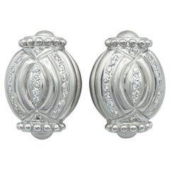 Brushed 18 Karat White Gold Domed Diamond Clip On Earrings