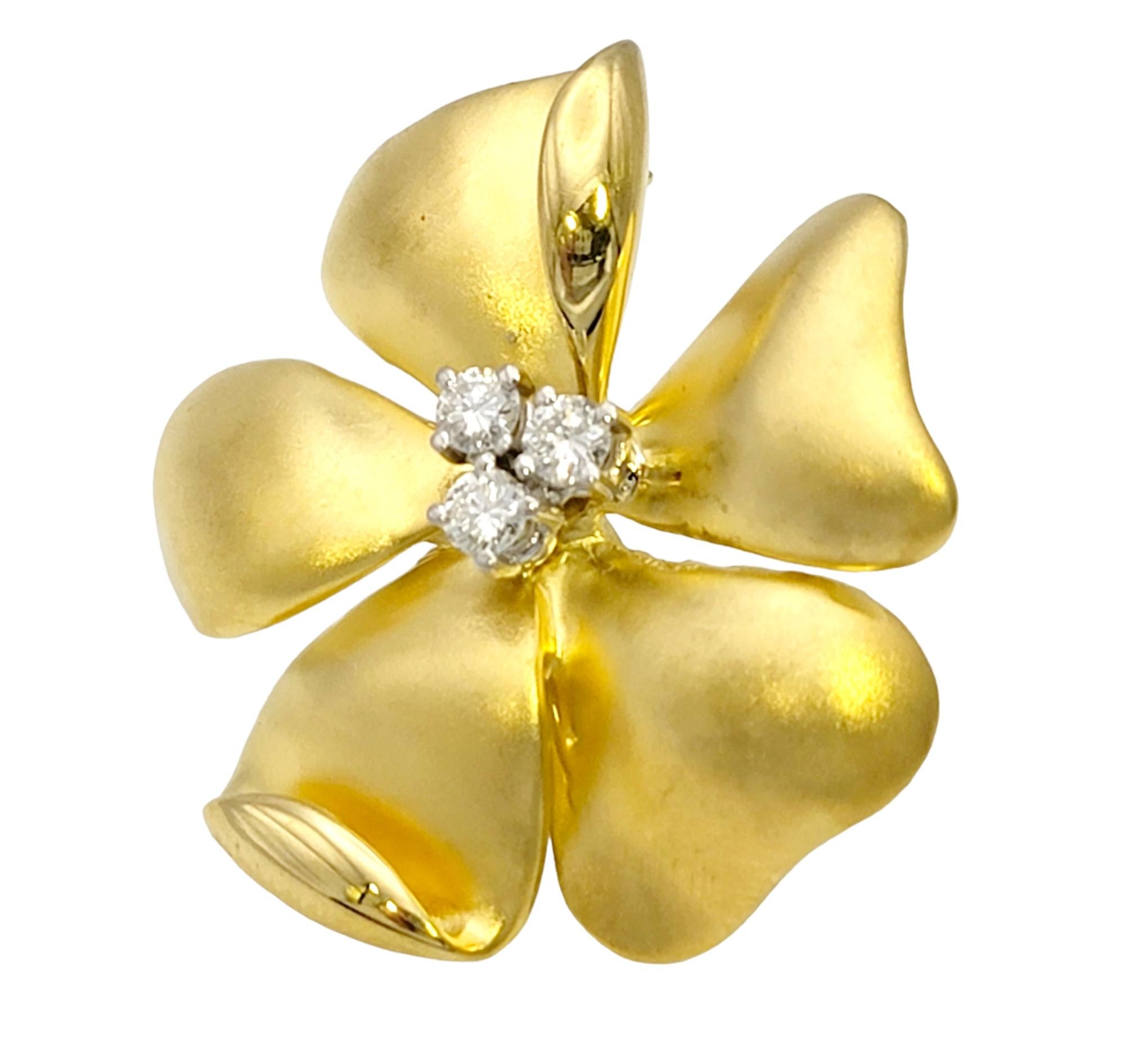 Round Cut Brushed 18 Karat Yellow Gold Flower Pin / Brooch with Round Diamond Accents For Sale