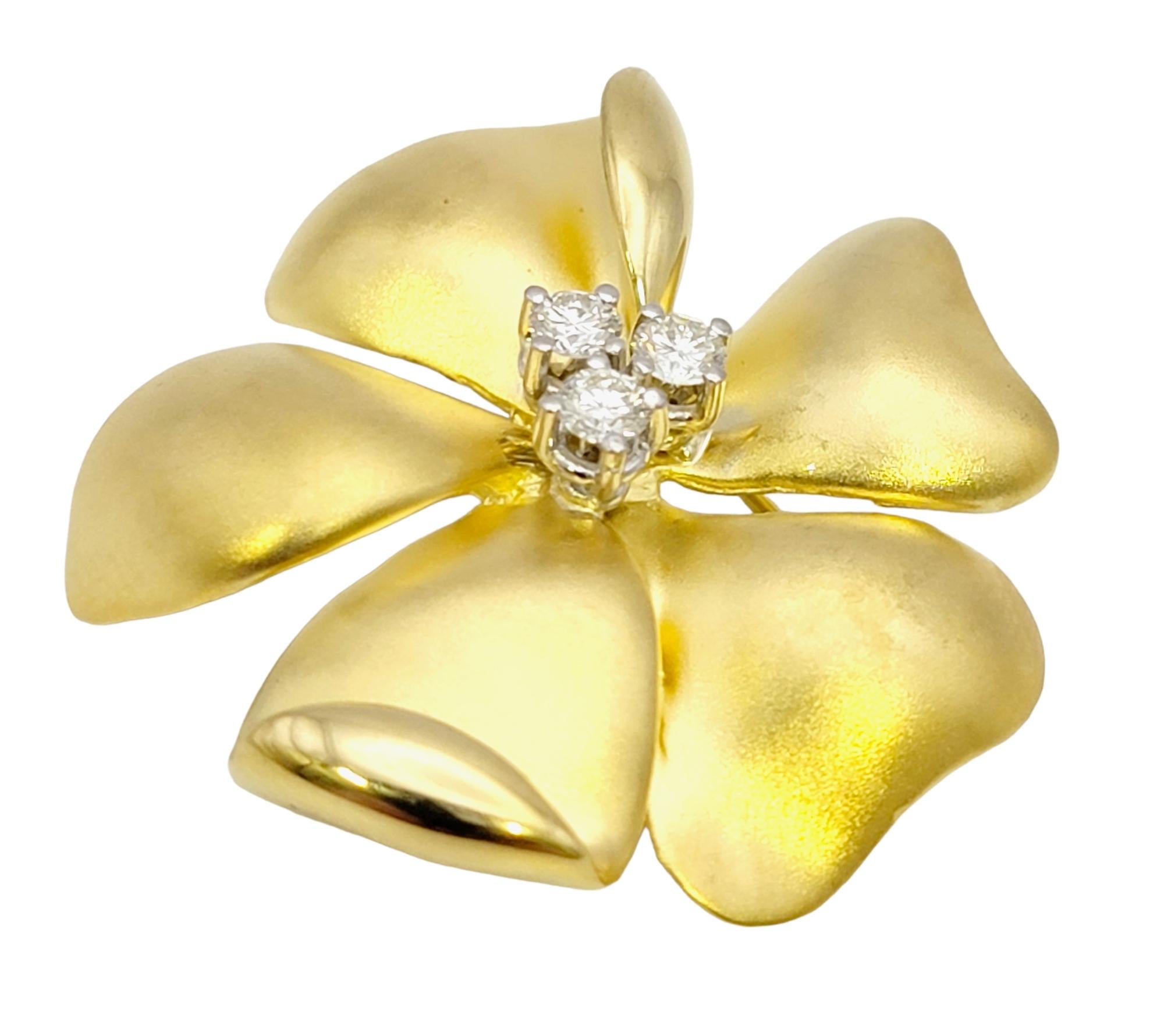 Women's Brushed 18 Karat Yellow Gold Flower Pin / Brooch with Round Diamond Accents For Sale