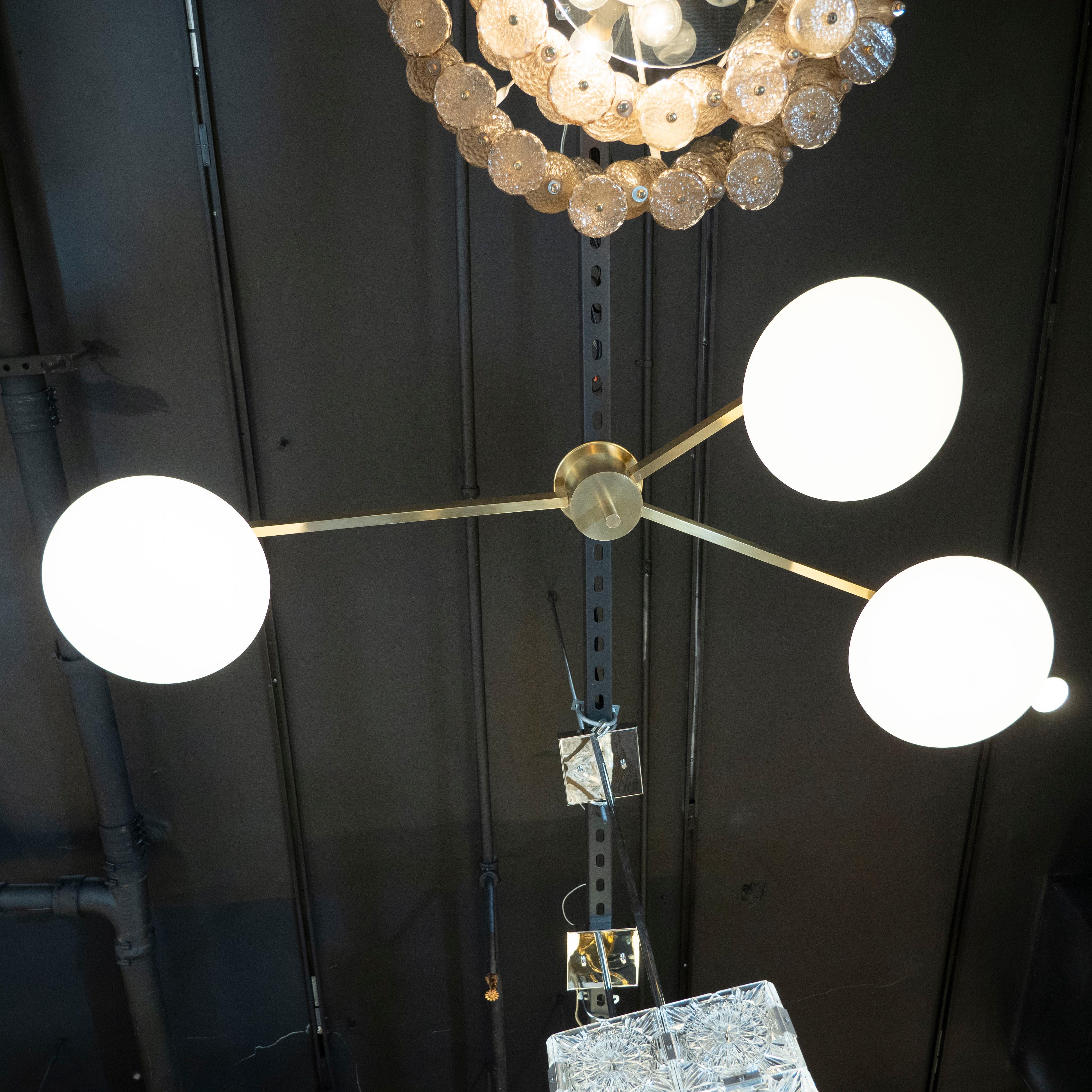 Brushed Brass and Frosted Glass Three-Arm Globe Chandelier, Manner of Arredoluce In Excellent Condition In New York, NY