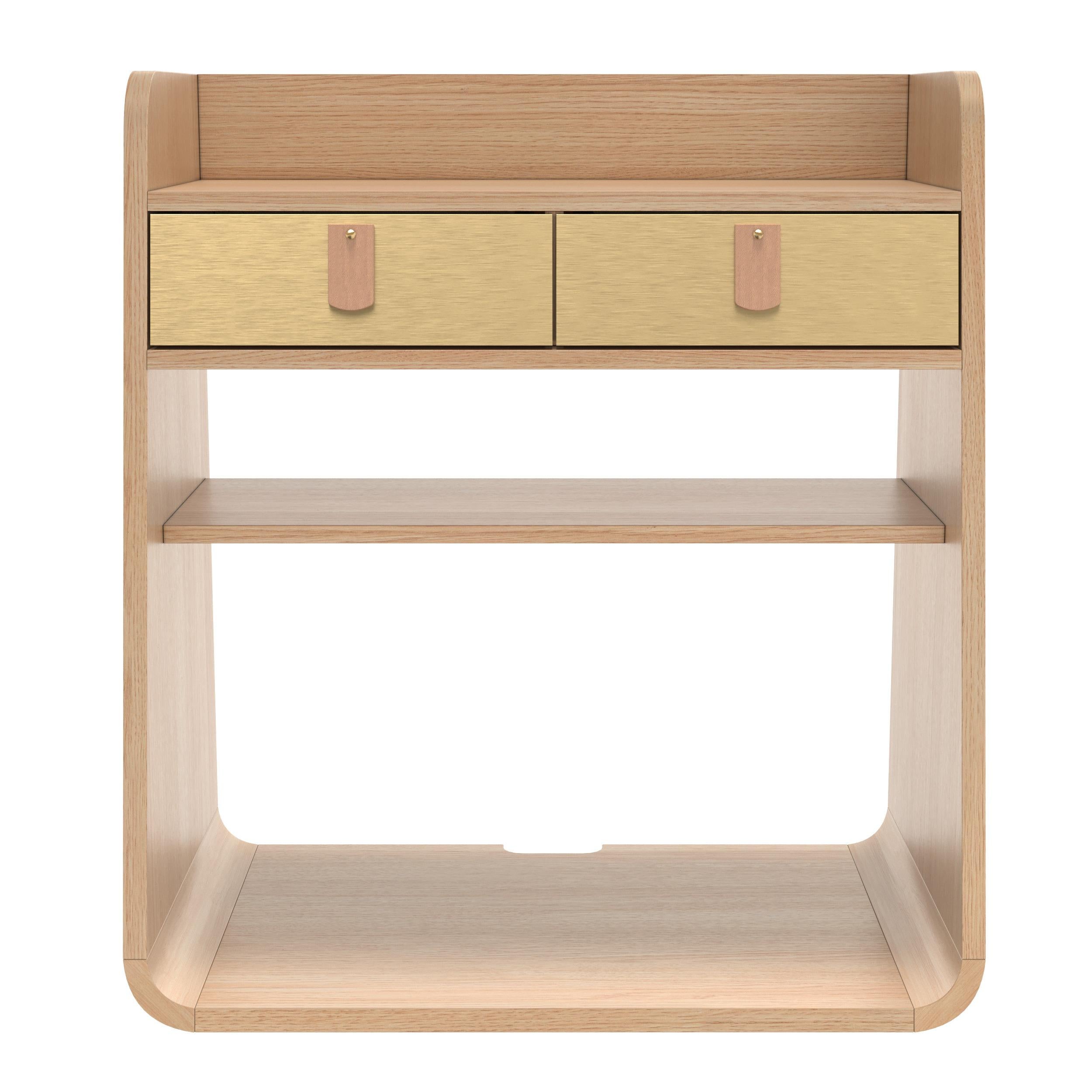 Brushed Brass Suzon Floating Nightstand Natural Oak by HARTO
Dimensions: W 36 x D 22.6 x H 39.7 cm. 
Materials: MDF wood veneer, Lacquered MDF, Leather. 
Weight: 5.5 kg

Suzon is a wall-mounted bedside table, ideal for saving floor space. Its small