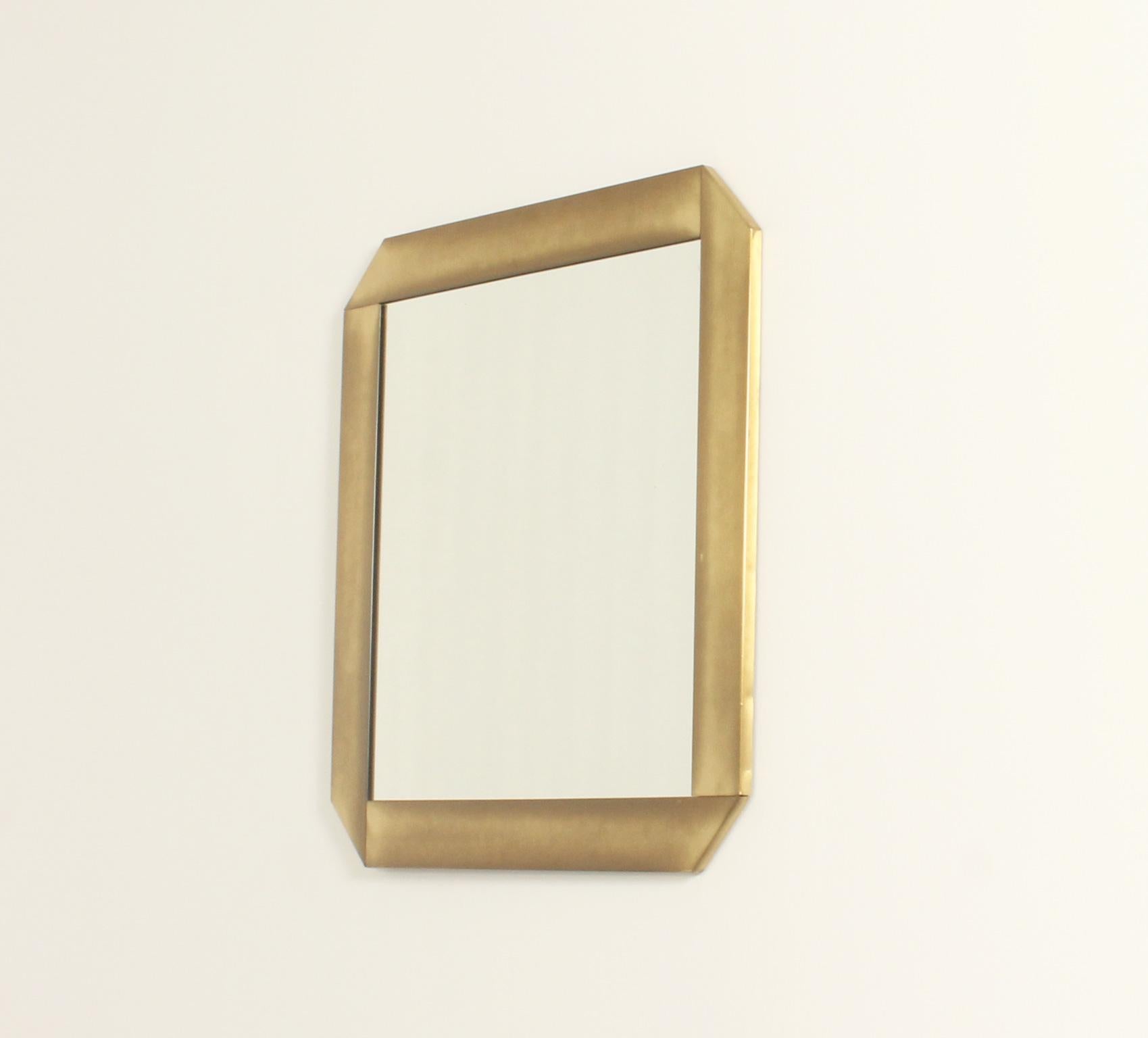 Wall mirror designed in 1970's by Valenti, Italy. Brushed brass and metal frame with mirror. 