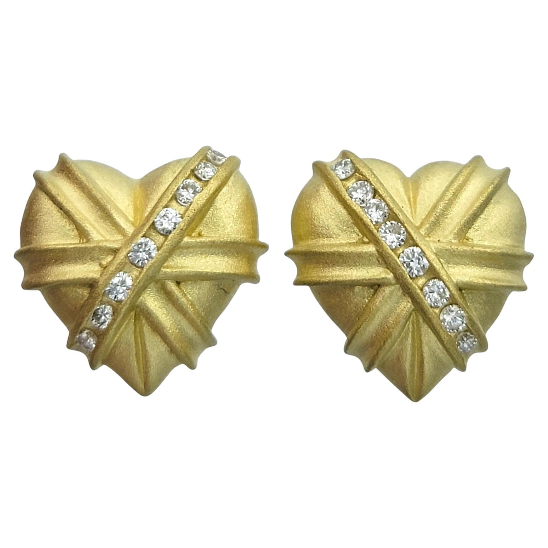 Brushed Finish 18 Karat Yellow Gold Textured Heart Earrings with Round Diamonds For Sale
