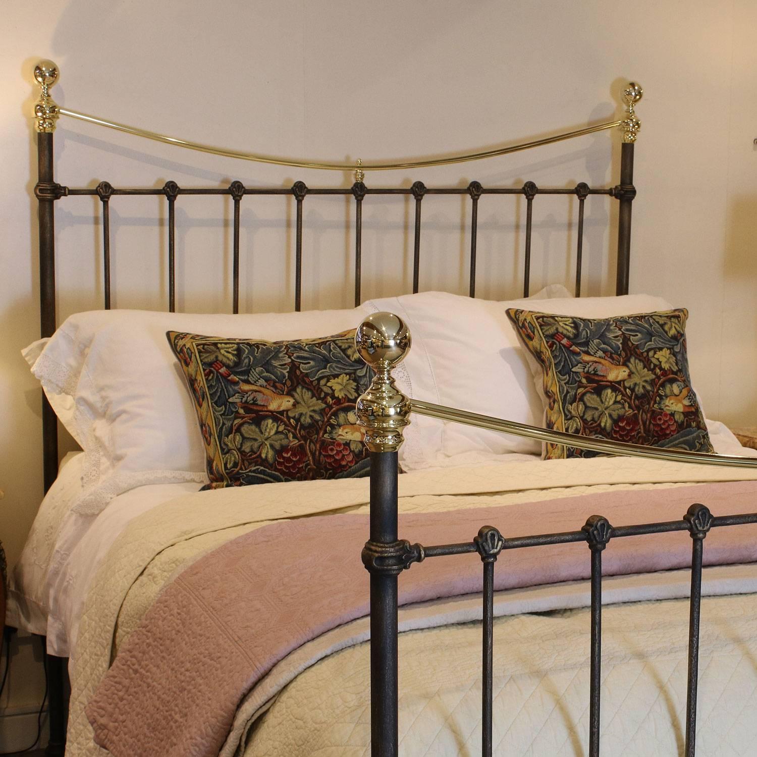 A brass and iron bedstead adapted from an original Victorian frame and finished in brushed gold with curved straight top rails and decorative castings.

This bed accepts a British king-size or US queen-size (measure: 5ft, 60 in or 150cm wide) base
