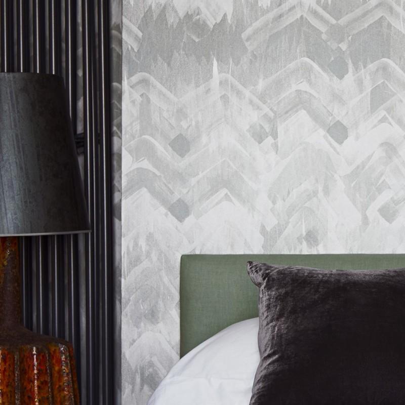 Reminiscent of the traditional weaving pattern found in twill fabric, Brushed Herringbones large V-shaped pattern and zigzag formation beautifully intertwine, creating subtle, textured gradients across delicately-colored brushstrokes. Available in