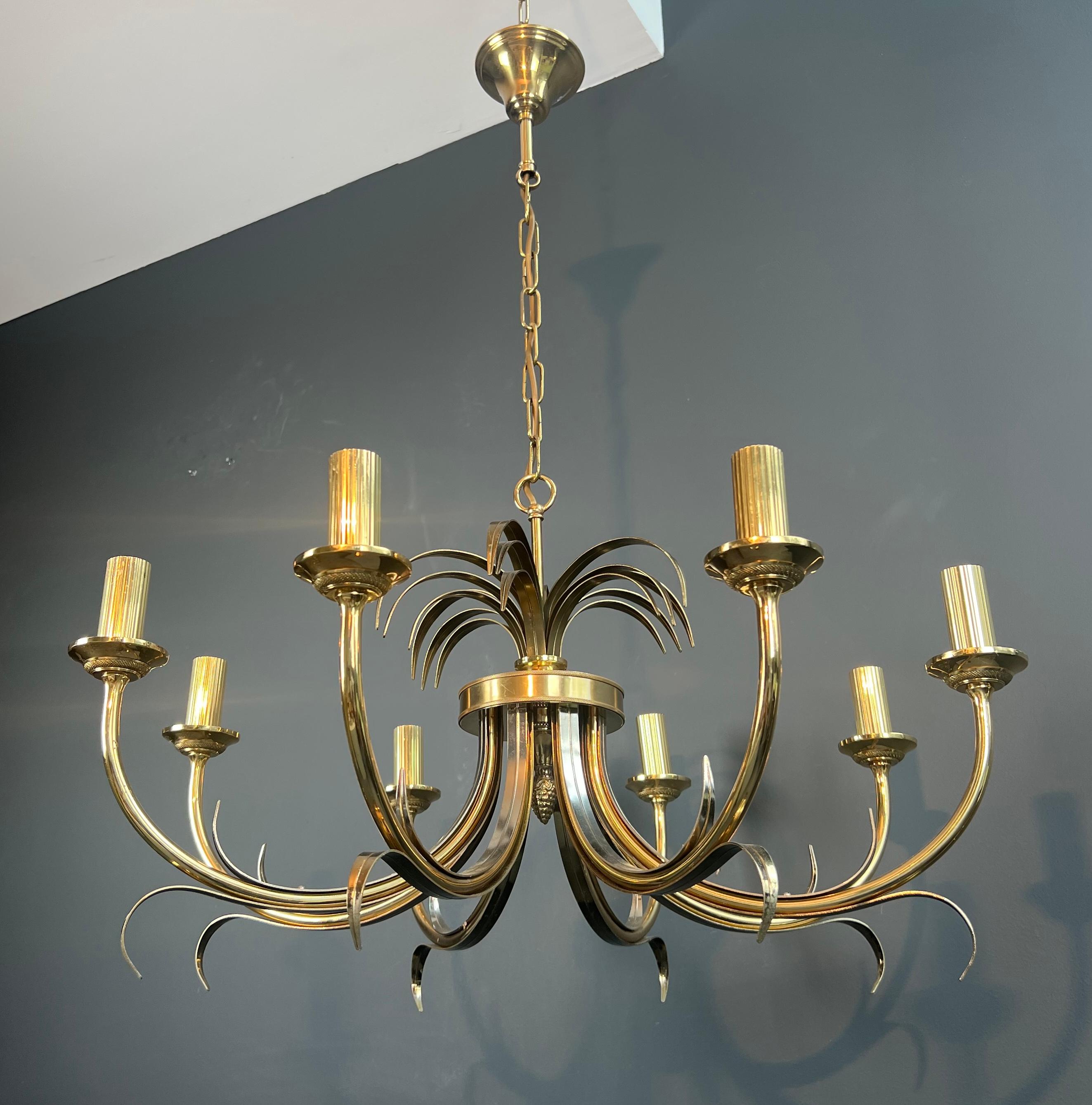 This very nice pineapple chandelier is made of brushed metal and gilt metal. This is a French work in the style of Maison Charles. Circa 1970