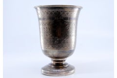 Brushed silver chalice with asymmetrical motifs
