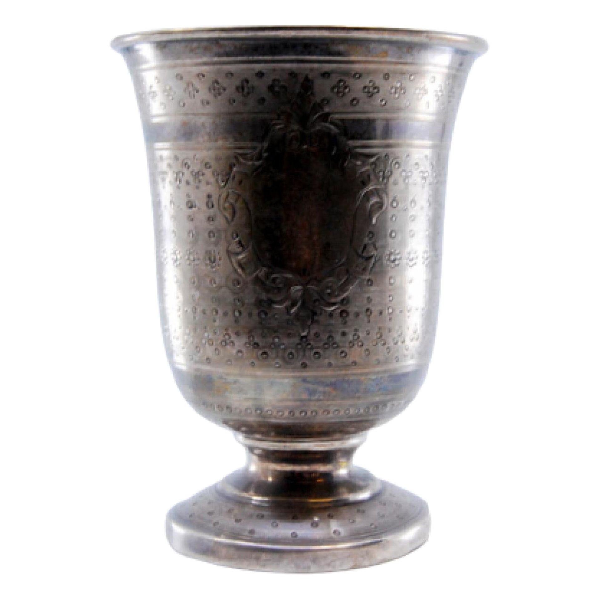 Brushed silver chalice with asymmetrical motifs
