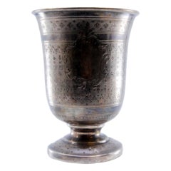 Brushed silver chalice with asymmetrical motifs
