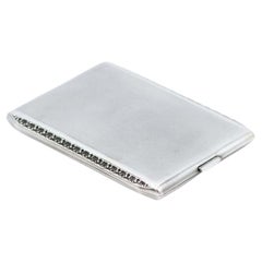 Brushed silver cigarette case with grooves along the length