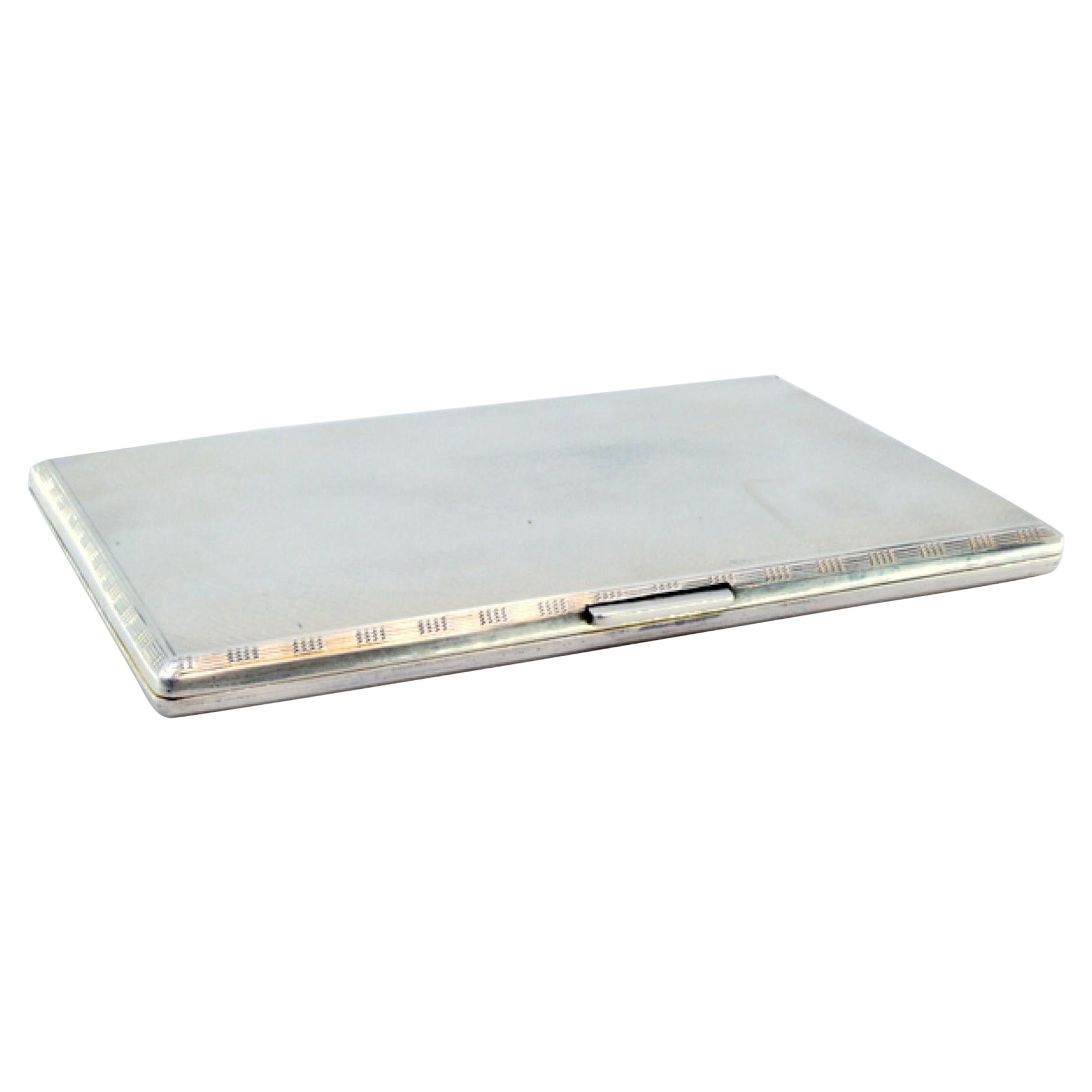 Brushed silver cigarette case with monogram card, gold interior and hinged lid
