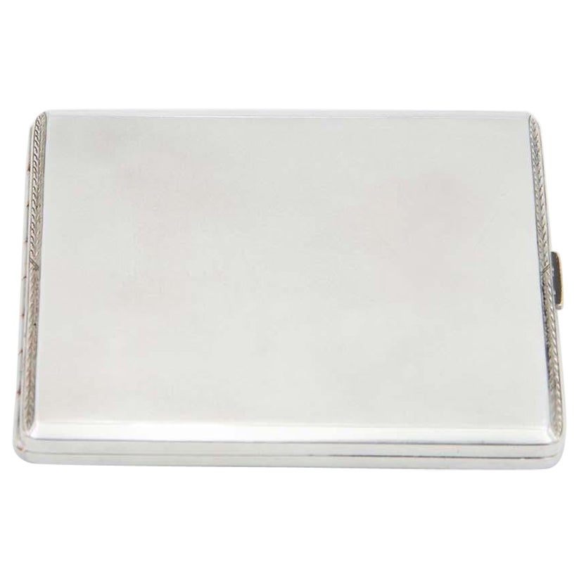 Brushed silver cigarette case with surrounding strips