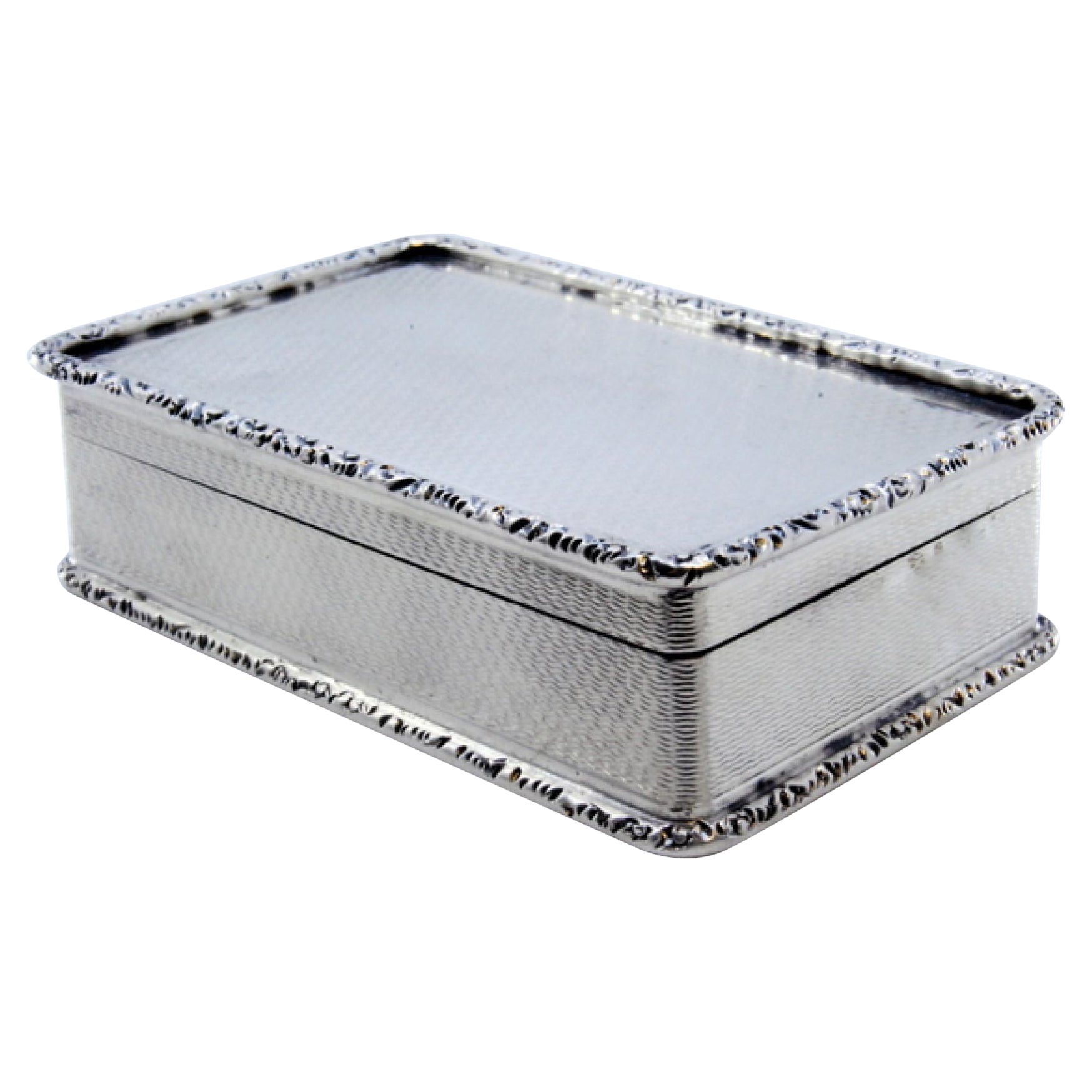 Brushed silver snuff box with friezes on the edge