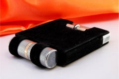 Scatola da toilette in argento spazzolato con rubini d'oro, specchio e astuccio