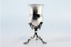 Brushed silver toothpick holder in the shape of a chalice