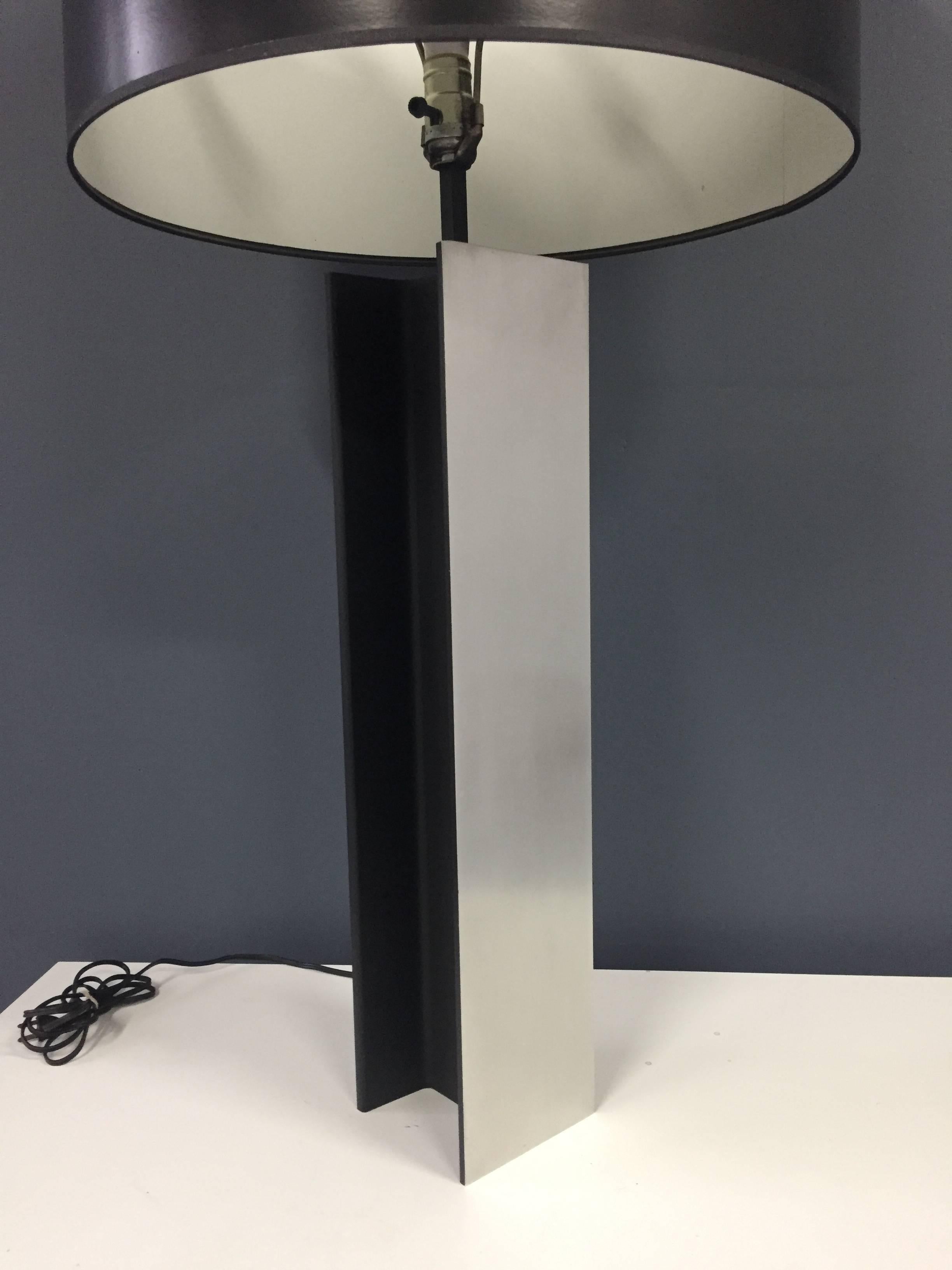 A substantial Laurel Lamp Company steel and black enameled steel I beam table lamp. This architectural lamp will add a significant impression to any room it's placed in.