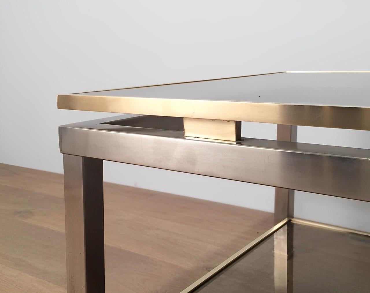 Brossé Table basse en acier brossé et laiton par Guy Lefèvre pour Maison Jansen en vente