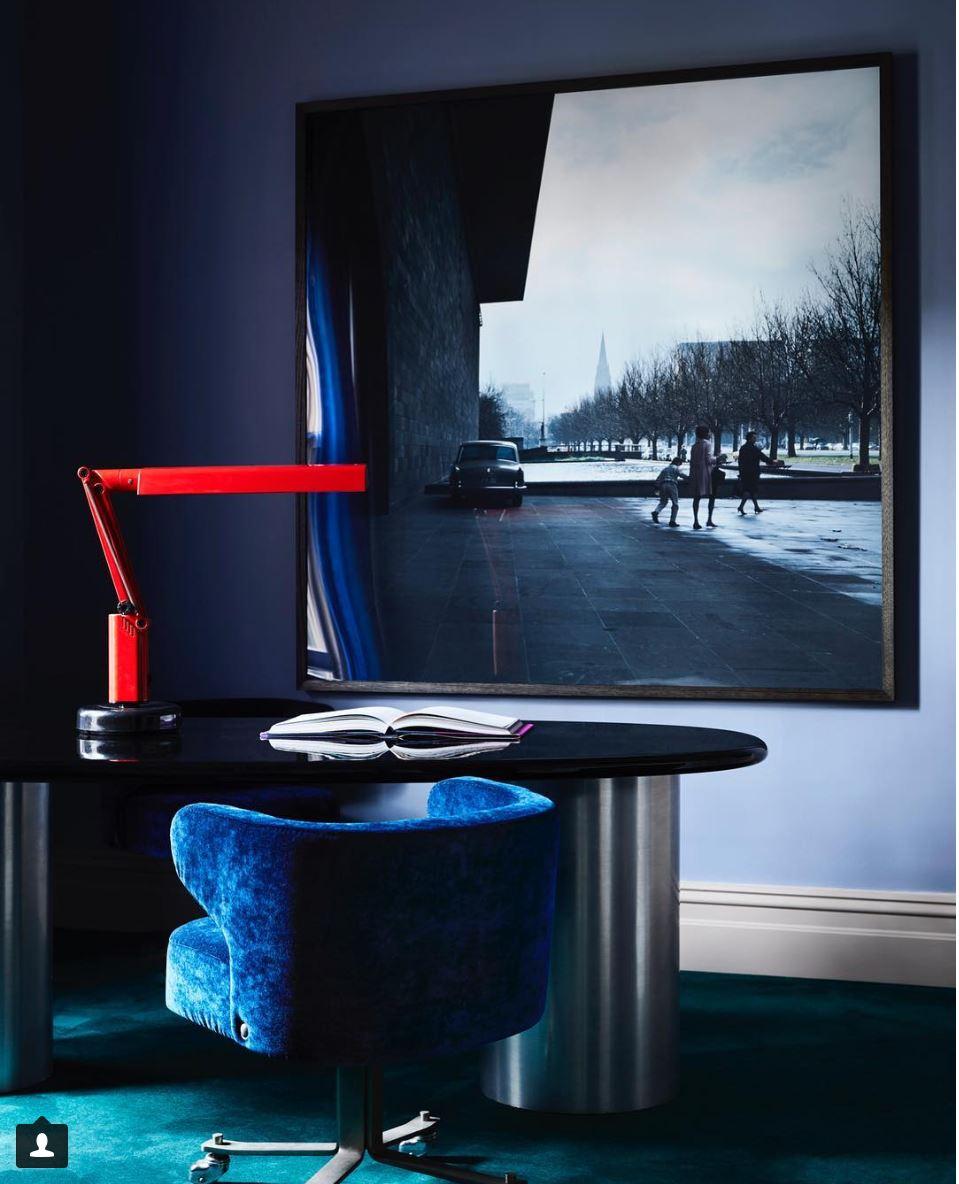 Vintage Italian desk made with brushed tubular steel base and black lacquered top.