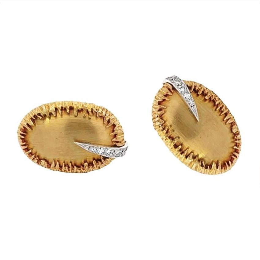 Brushed 14 karat yellow gold hand-made diamond cufflinks crafted with a uniquely designed trim and diamond accent.
These beautiful cufflinks are perfect for someone who appreciates the art of dressing up. Their vintage aesthetic is one from the