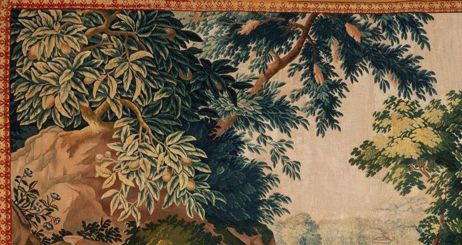 Brussels 18th century Bacchanale Tapestry, circa 1760 7'4 x 10'6 wide. A Brussels tapestry early 18th century. A Bacchanale scene of young children drinking from wine barrels under a canopy of leafy trees with colorful flowers. A tall stately