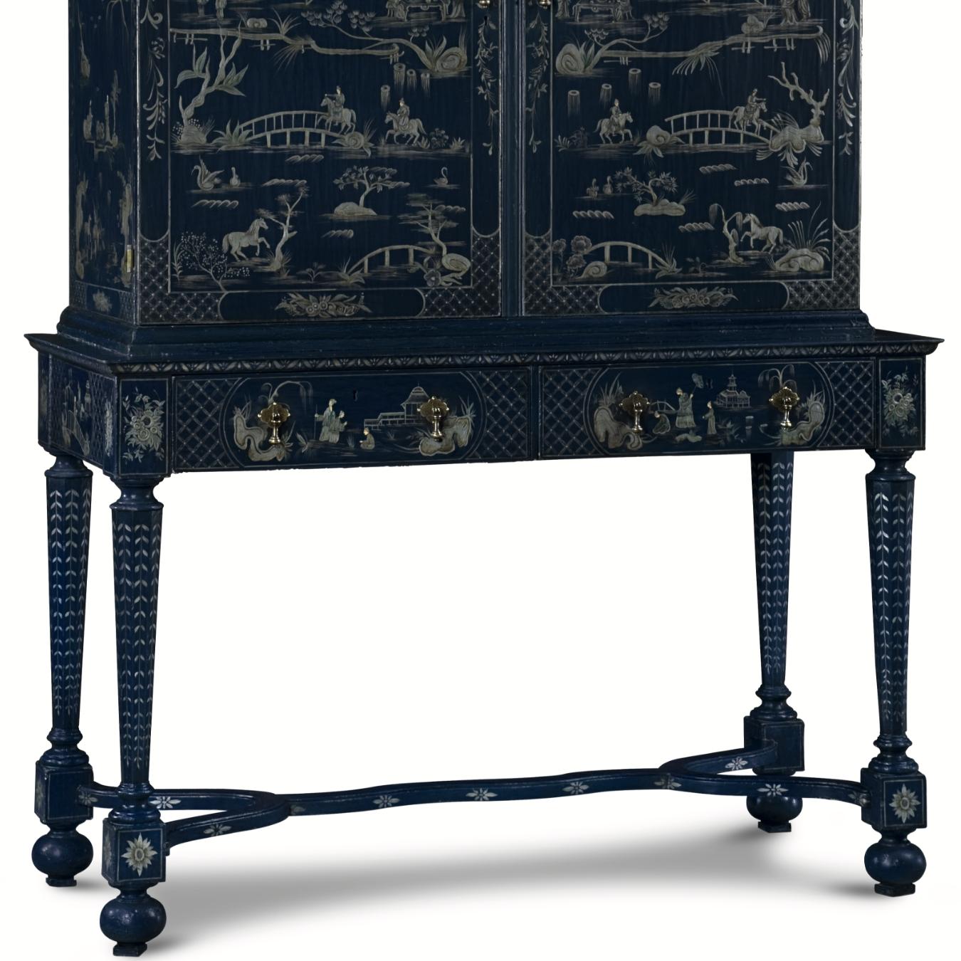 This XVIIIth century cabinet is a standing work of art. Decorated with hand-painted Chinoise landscapes and figurines, it also has a stand with facetted baluster shaped legs that are harmoniously joined by a stretcher.
  