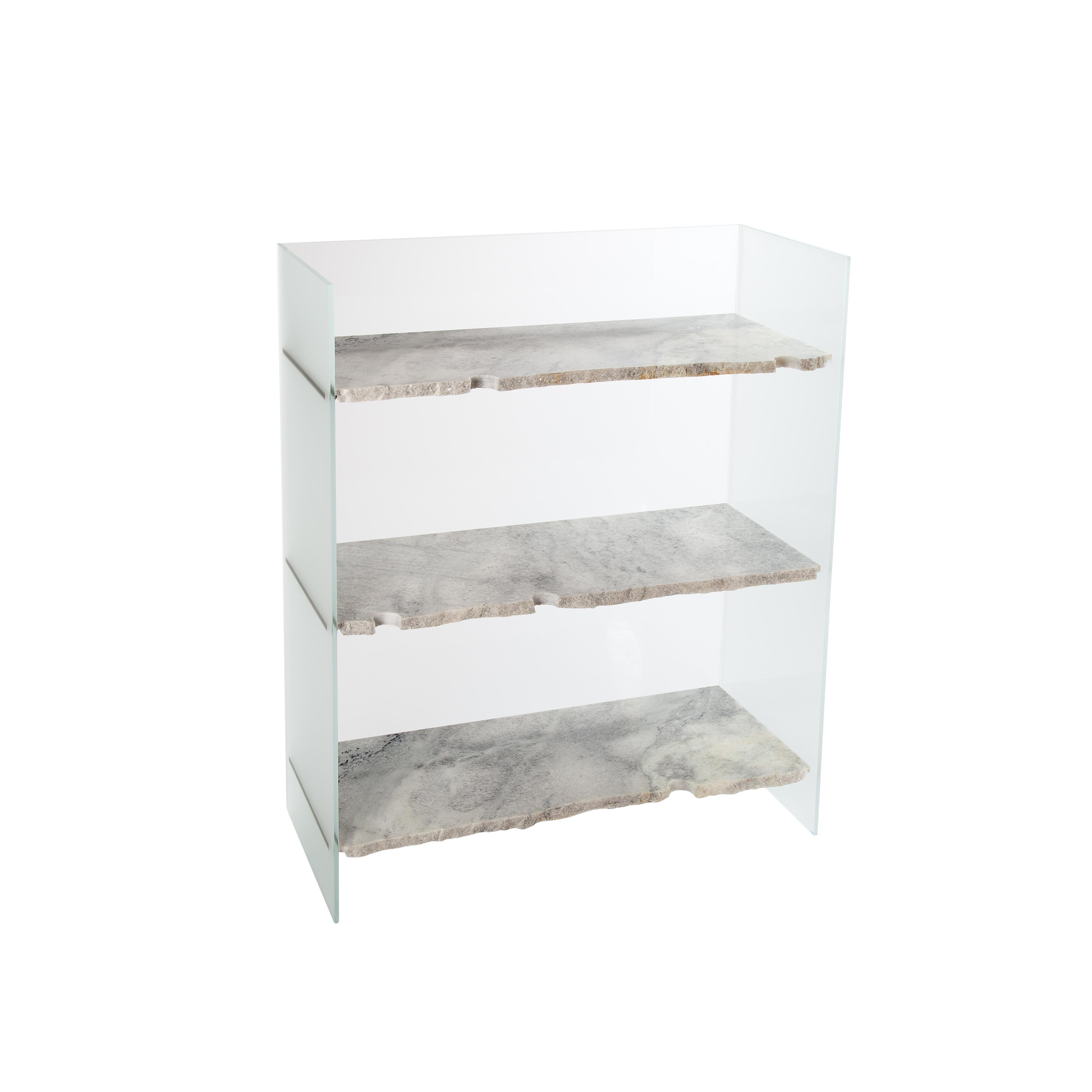Brut Satinato White Shelves by Pulpo
Dimensions: D80 x W35 x H100 cm
Materials: glass and marble

Also available in different finishes. 

Art Brut: Ferréol Babin’s working method is often that of a sculptor. With brut, he even left the