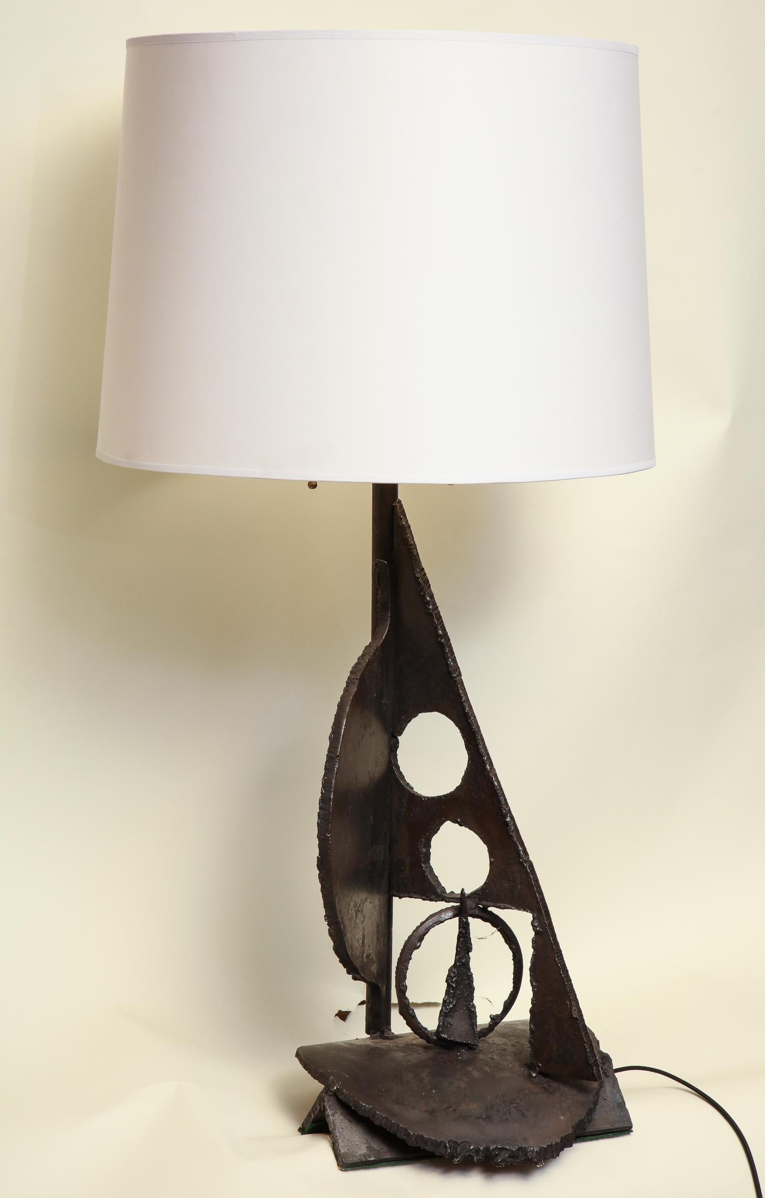 A Brutalist table lamp handcrafted iron Mid-Century Modern new sockets and rewired, American, 1960s.
Shade not included.