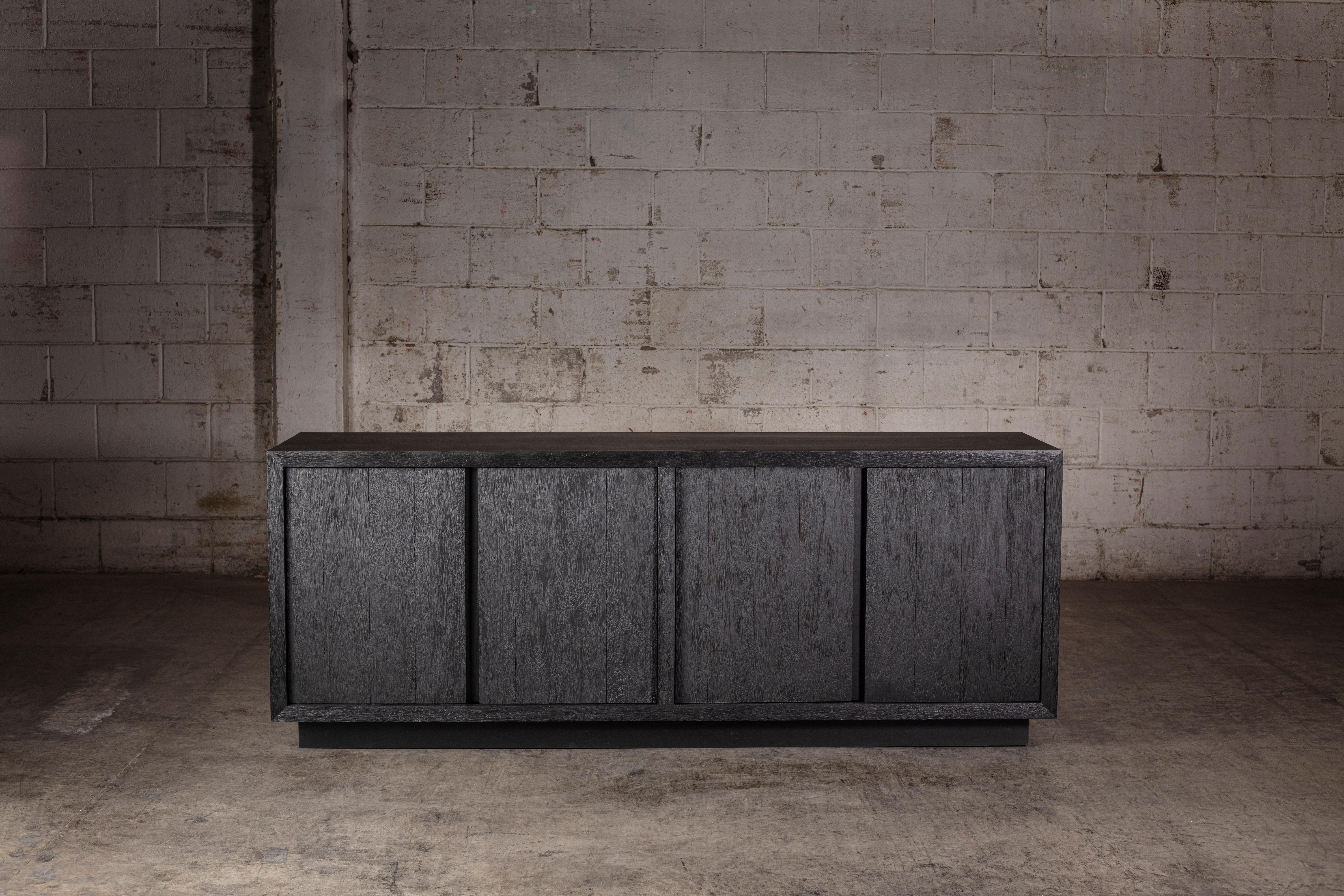 Brutal Oak Sideboard in Solid Black Oak by No Age Studio
Dimensions: D 45.7 x W 183 x H 71.1 cm. 
Materials: Oak. 

No Age Studio - Handcrafted Furniture

Every piece we create is made to order, crafted with care and precision to meet your specific