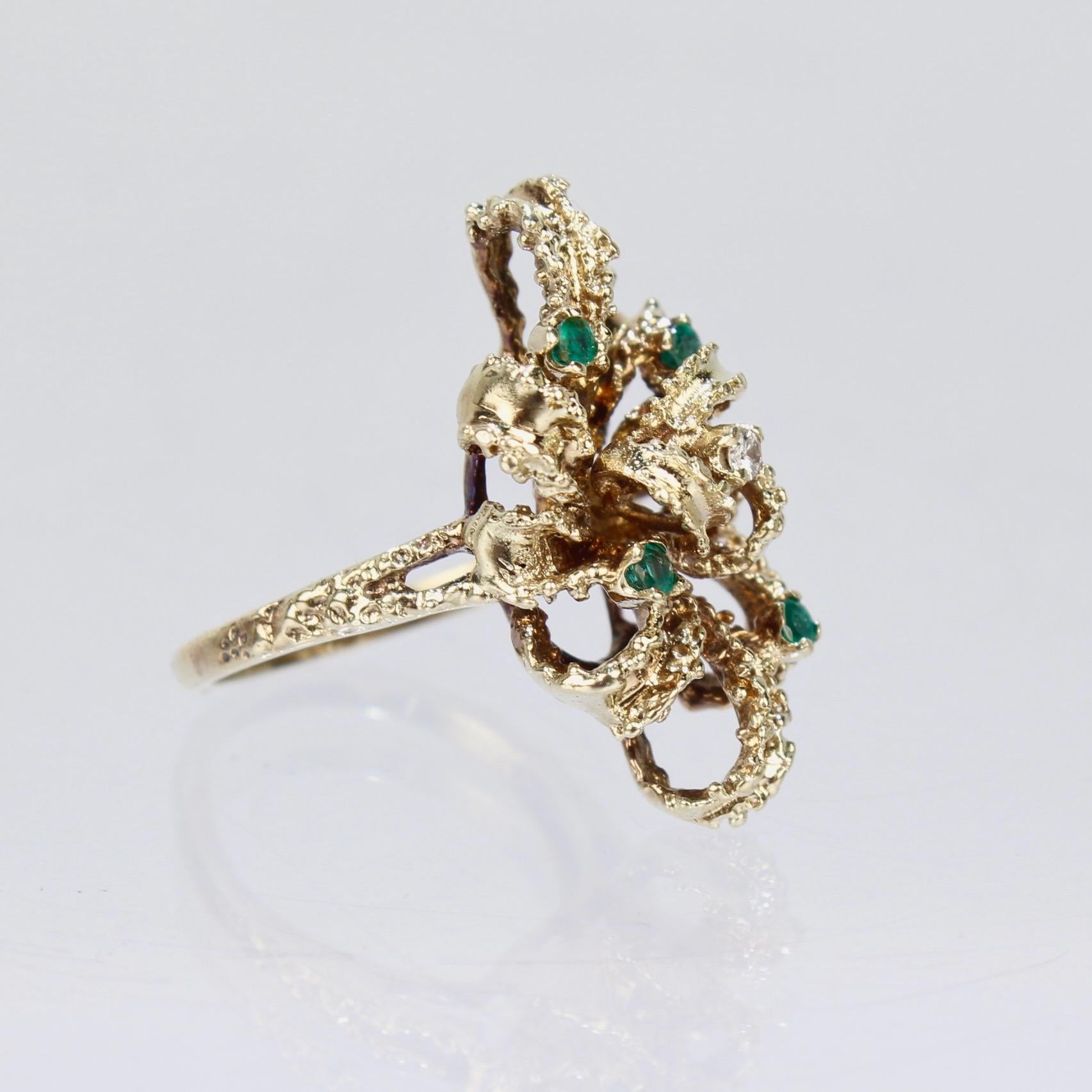 Brutalist 14 Karat Gold Emerald and Diamond Bow Form Cocktail Ring For Sale 3
