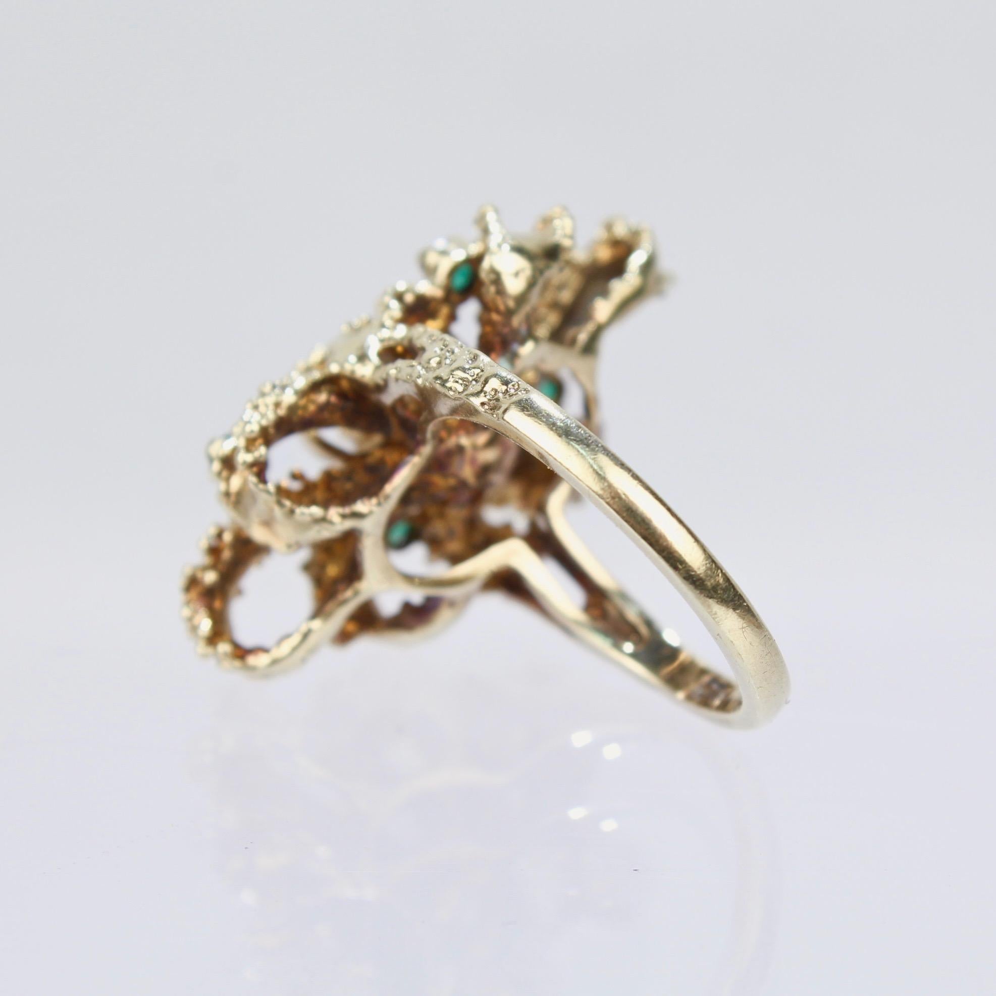 Round Cut Brutalist 14 Karat Gold Emerald and Diamond Bow Form Cocktail Ring For Sale