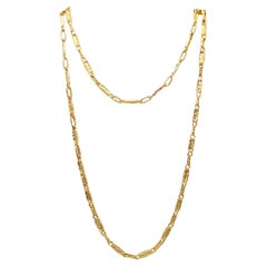 Chaîne longue texturée artistique BRUTALIST 1970 en or jaune massif 14 carats