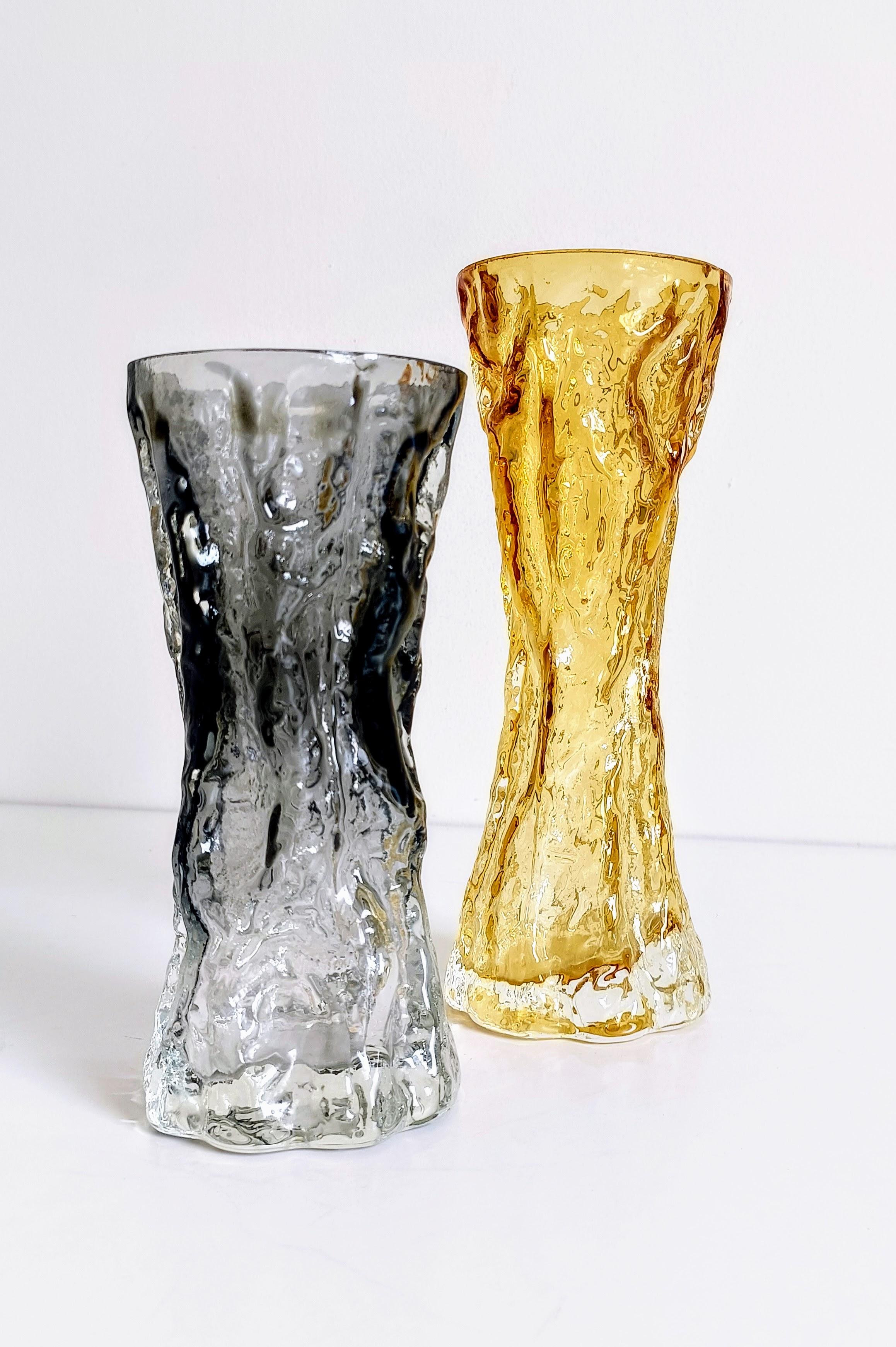 Pair of Brutalist 1970s Art Glass Vases by Kurt Wokan for Ingrid Glashütten

A unique pair of moulded art glass vases designed by Kurt Wokan, then Creative Director at Ingrid Glashütten. Handmade in Germany in the 1970s, the vases feature the
