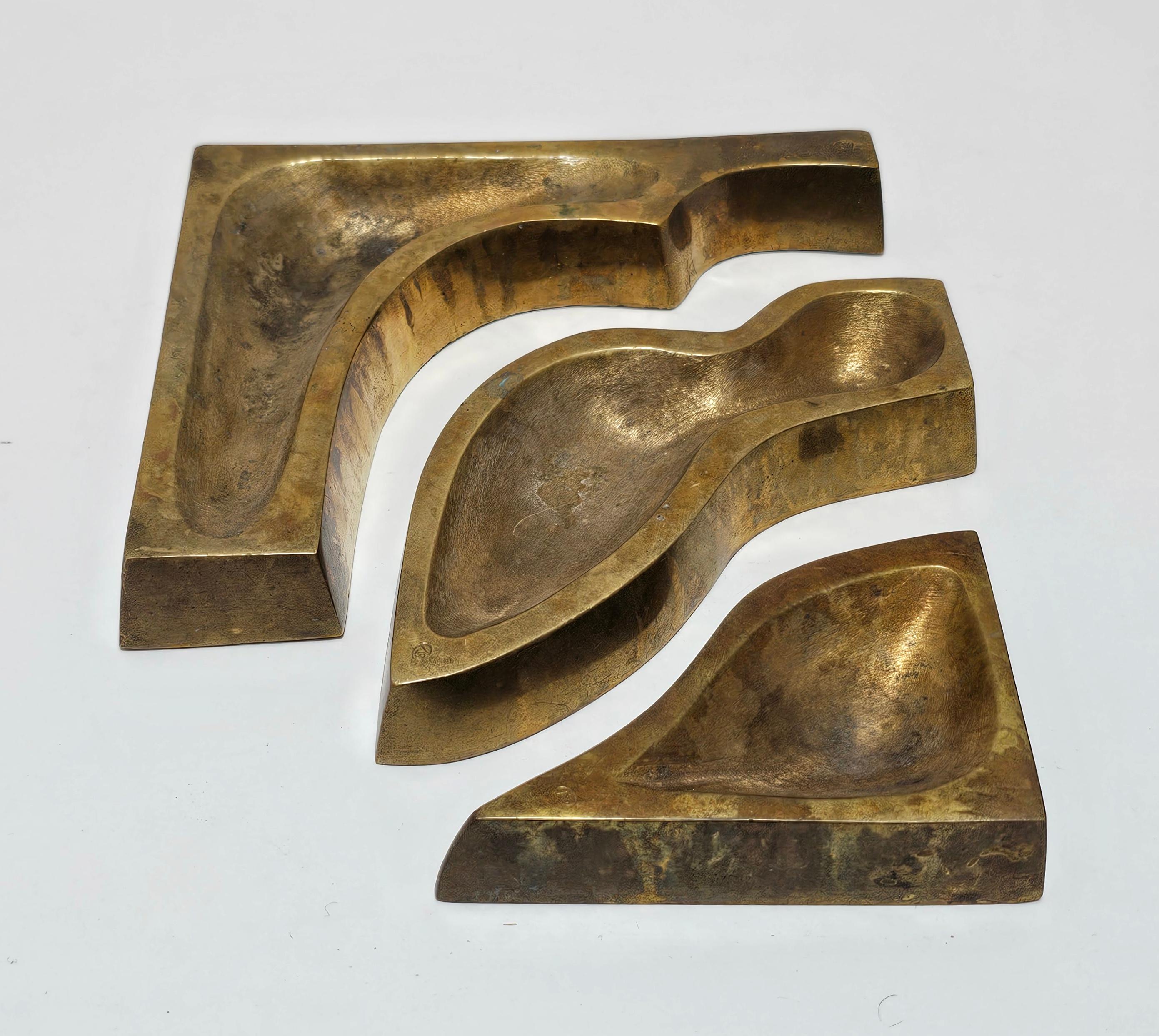 In this listing you will find a spectacular Brutalist 3-piece Cigar ashtray done in bronze and designed by Yugoslav architect Vera Stanarcevic. This sculptural piece allows you to have a playful piece of decor that has both artistic and practical