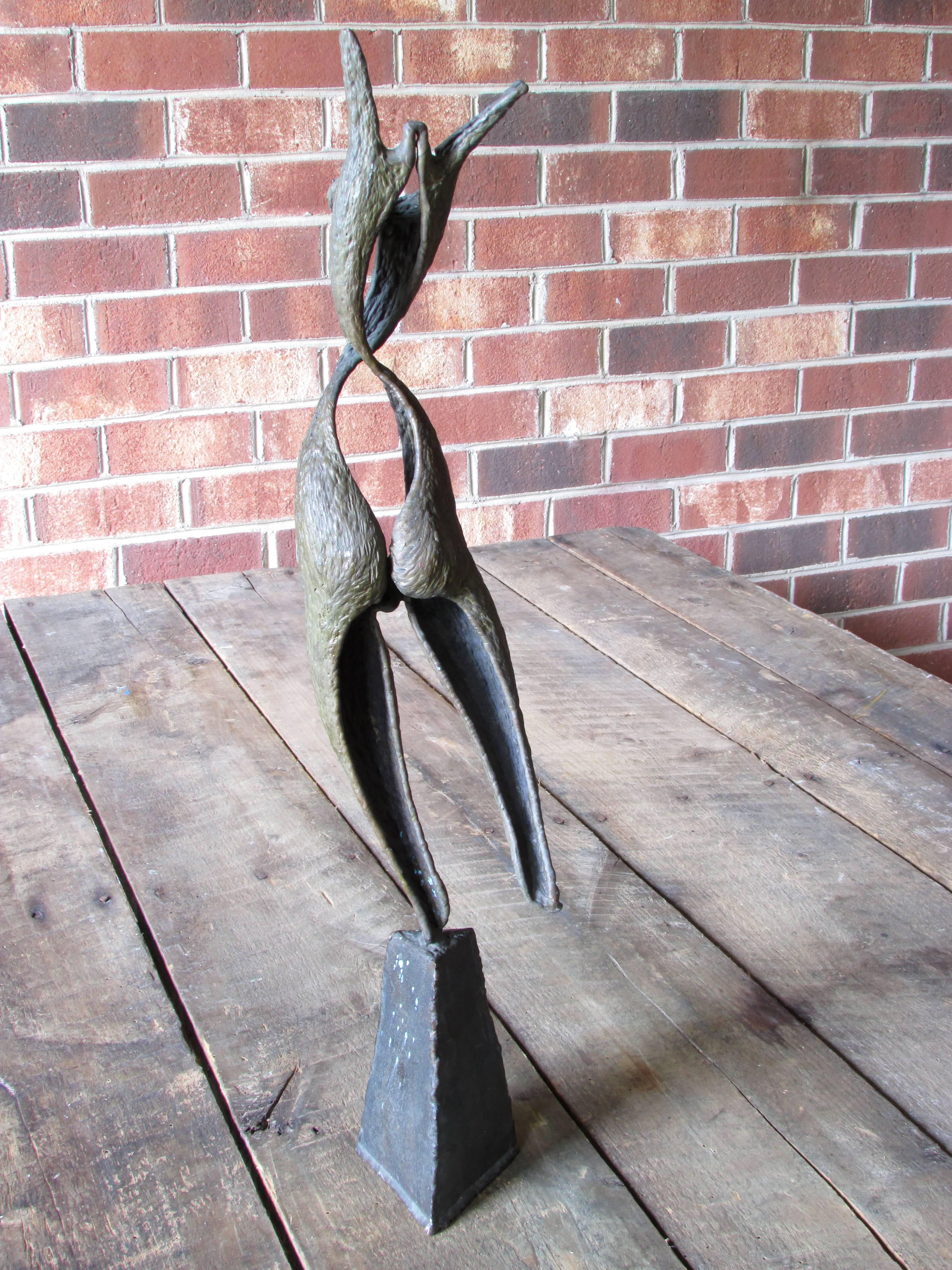 Beautiful bronze sculpture of an abstract nude in motion done in the Brutalist style.