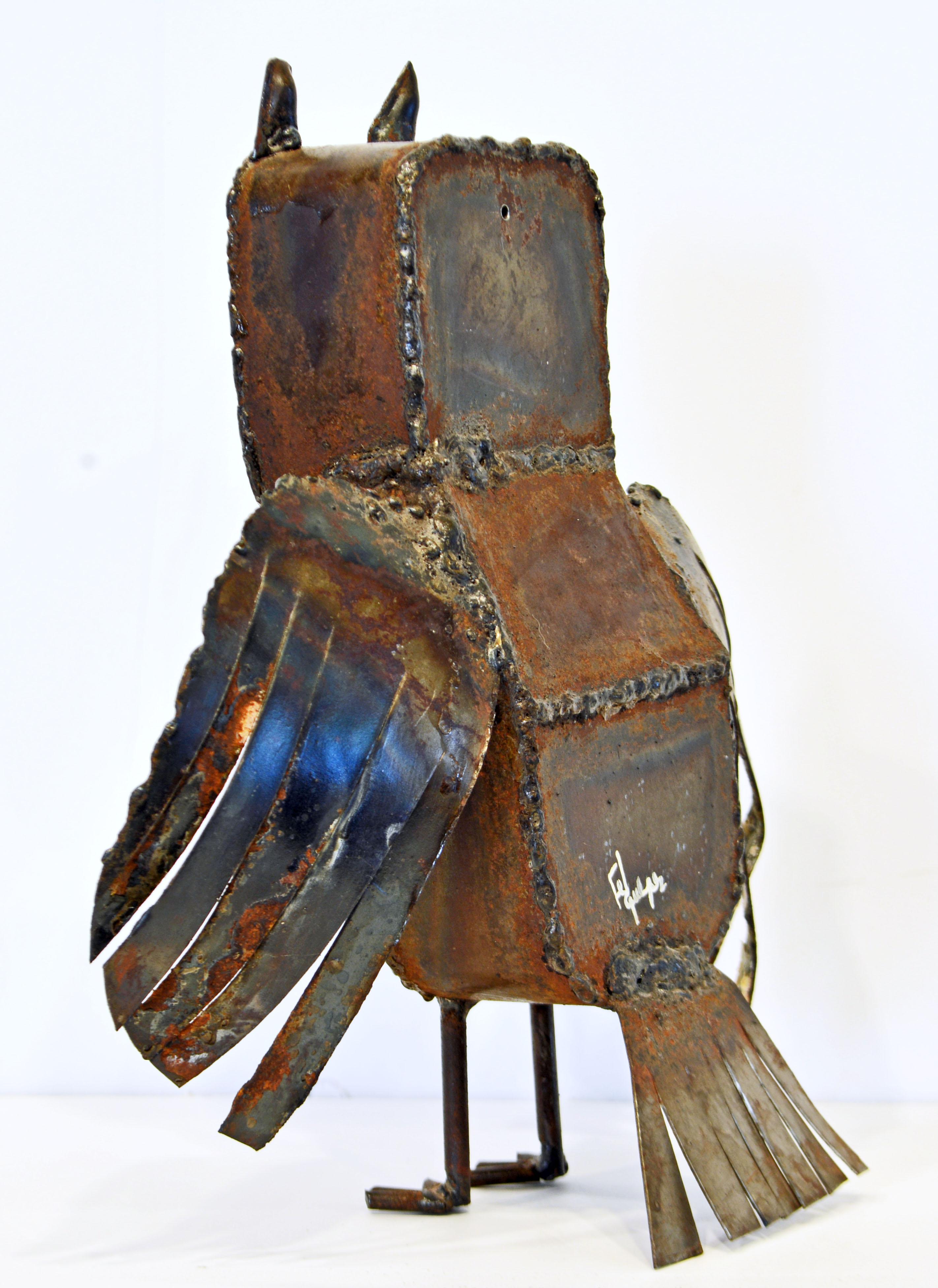 metal owl sculpture