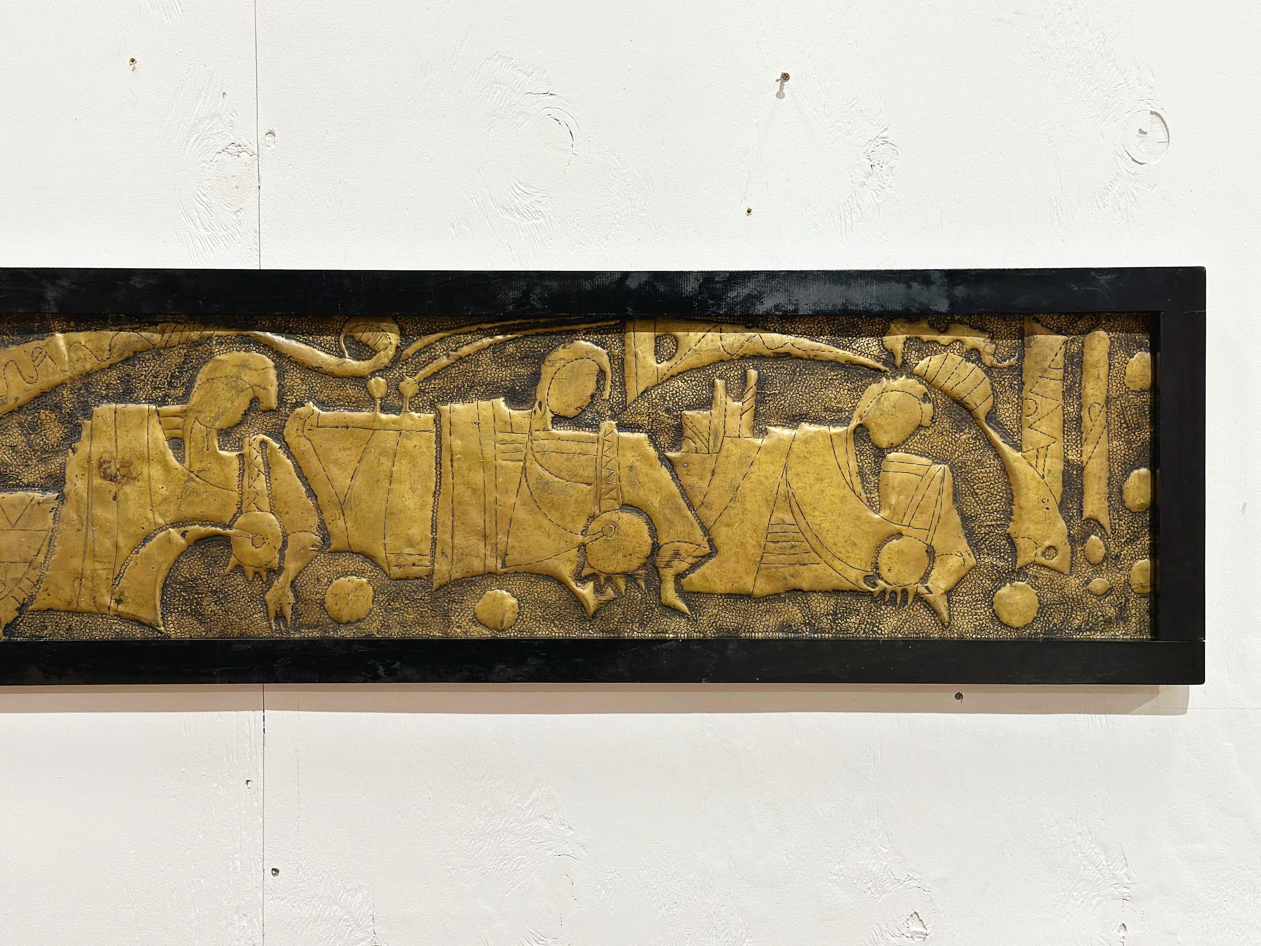 Stunning vintage brutalist style abstract framed wall hanging. Over 6 feet long. Gorgeous embossed and hammered brass displays a wonderful patina. 
I think the subject could portray some sort of ancient naval battle.