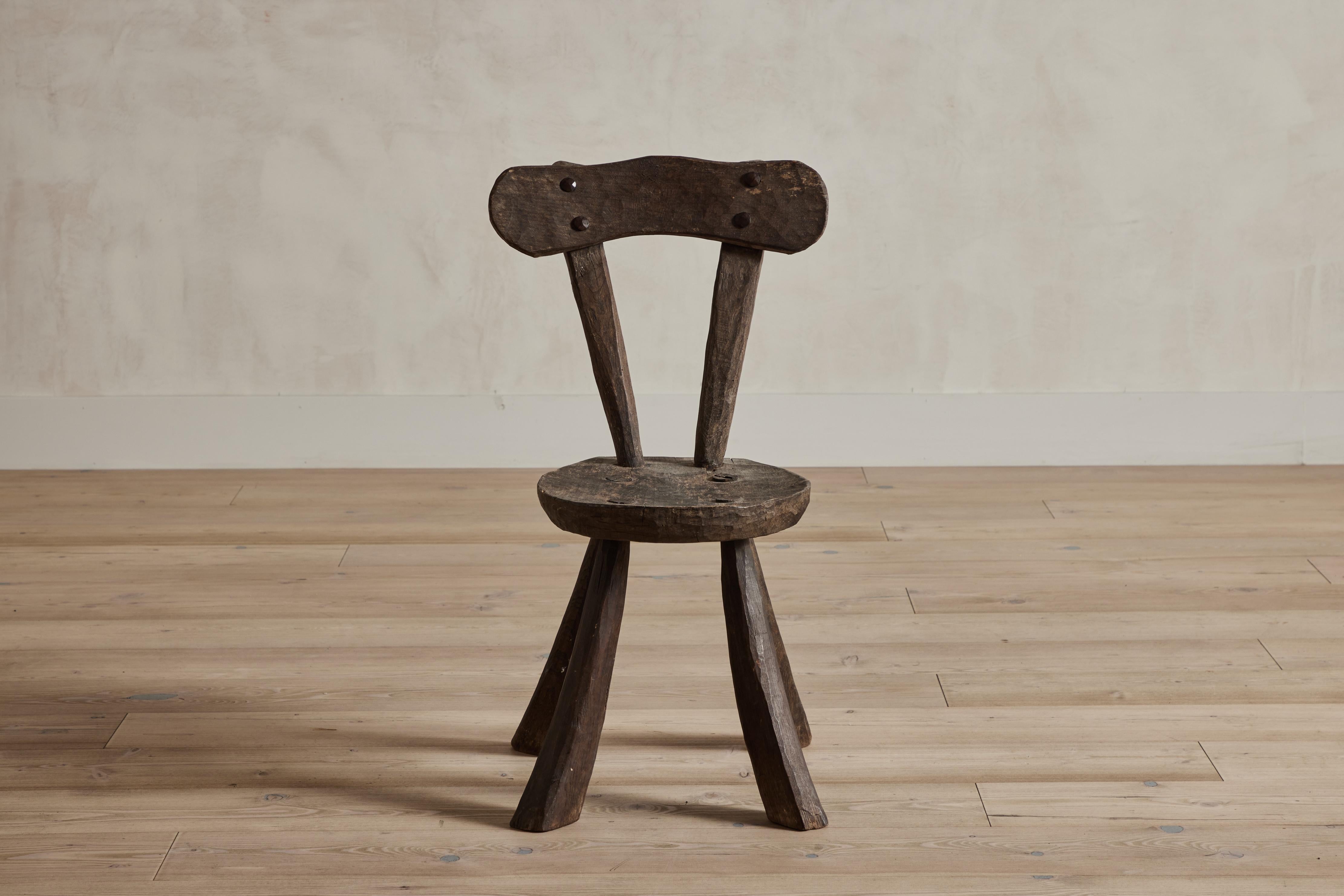 Small brutalist wood side chair attributed to Alexandre Noll. France circa 1950. Some wear on wood that is consistent with age and use. 