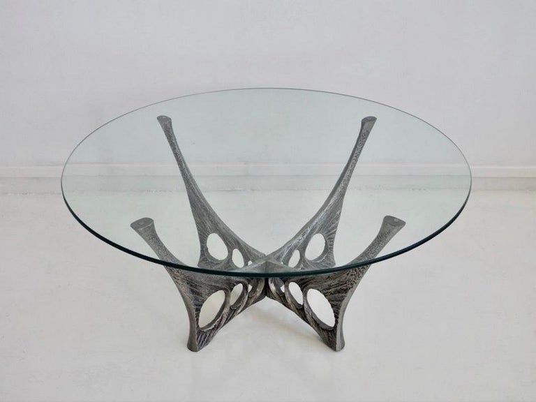 Brutalist coffee table by Belgian designer Willy Ceysens, circa 1960s. Structure made of aluminum featuring organic design. Loose glass tabletop.