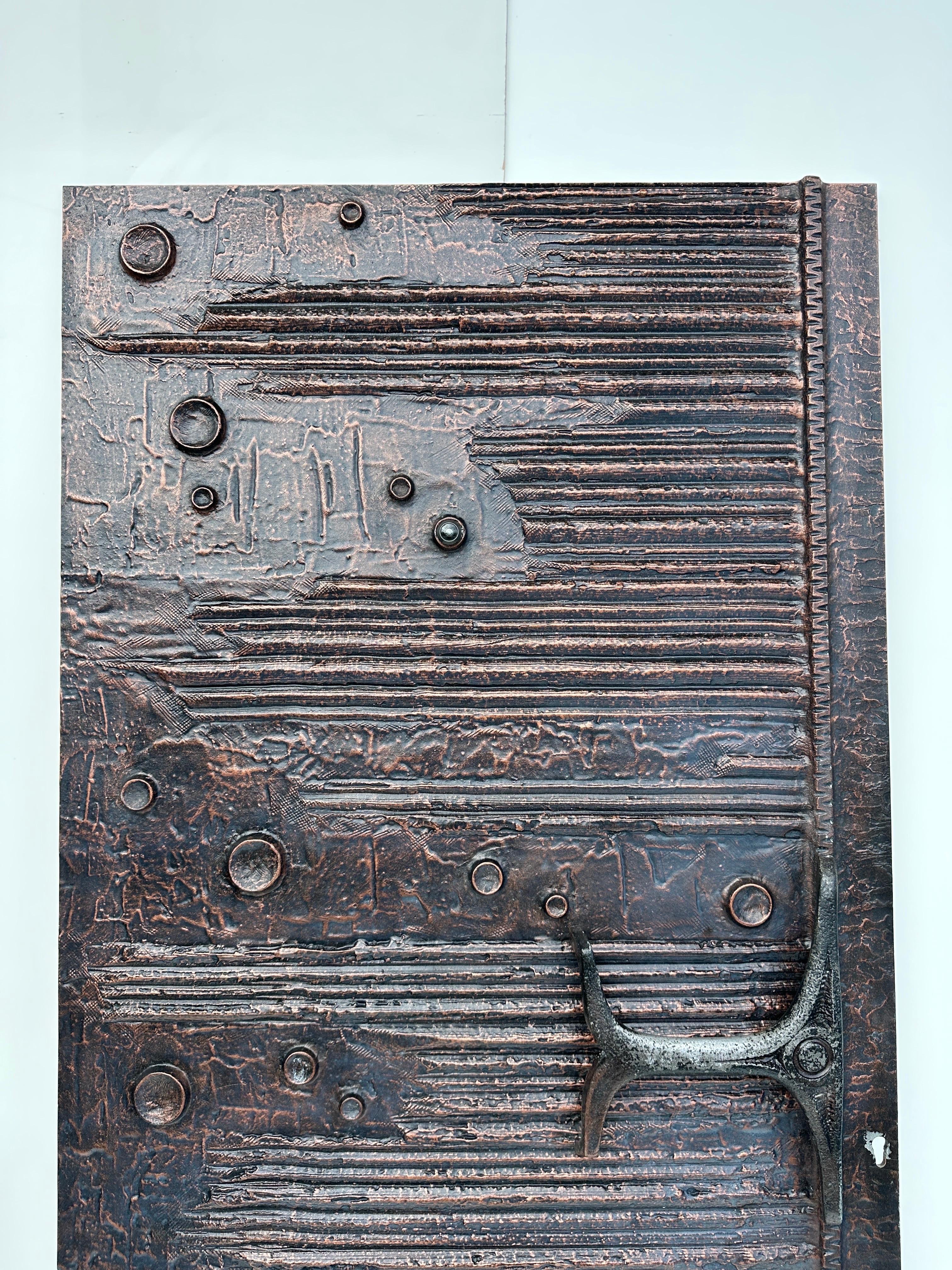 Brutalist cast aluminum door panel with handle in anodized bronze / copper finish made in Belgium in 1970’s. In the style of Billy Joe McCarroll and David Gillespi 