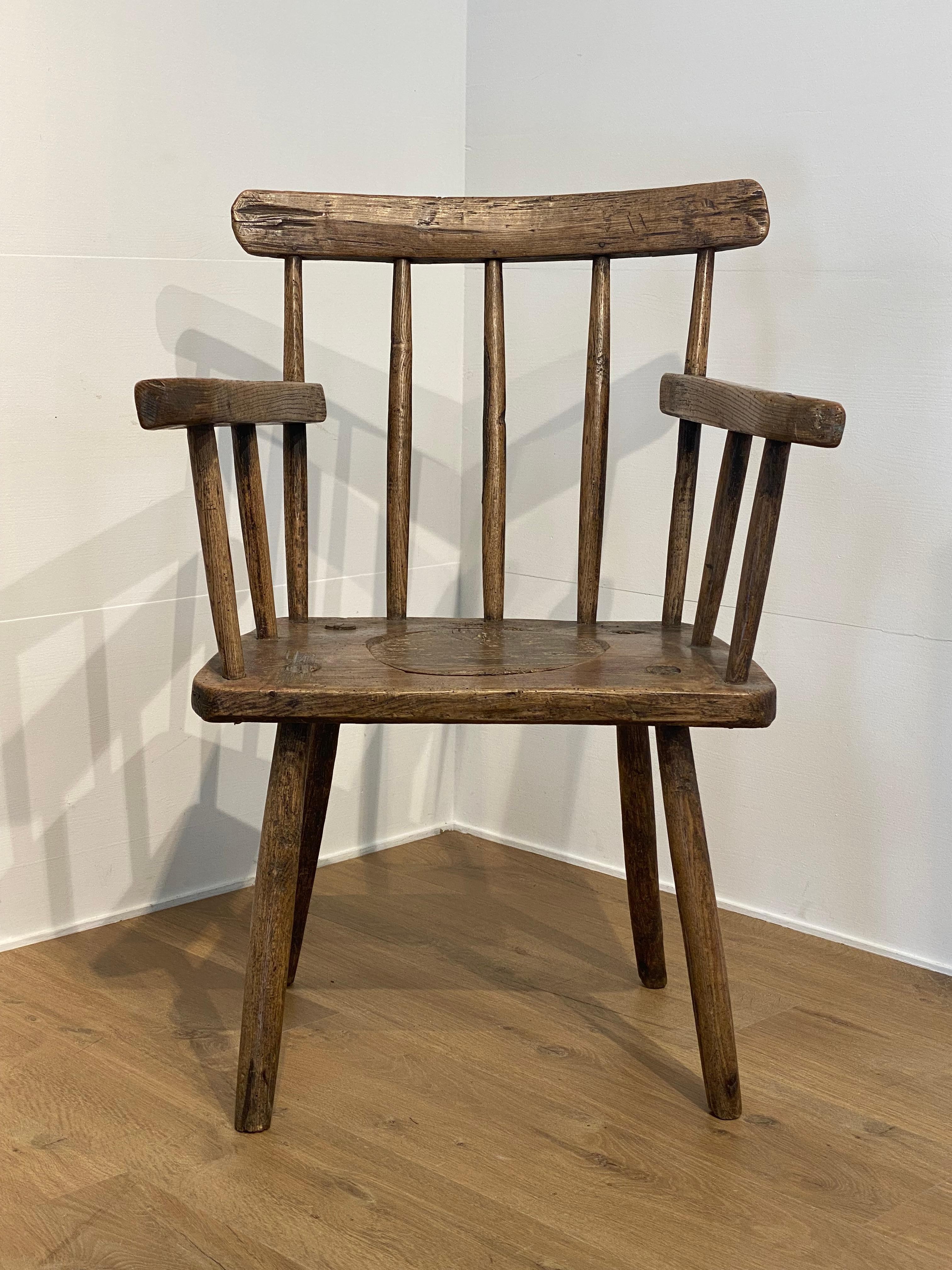 Elegant brutalist and antique wooden Chair from England,
19 th Century, very powerful but simple design,
good piece of furniture to combine with contemporary furniture,
warm and shiny shine of the wood
