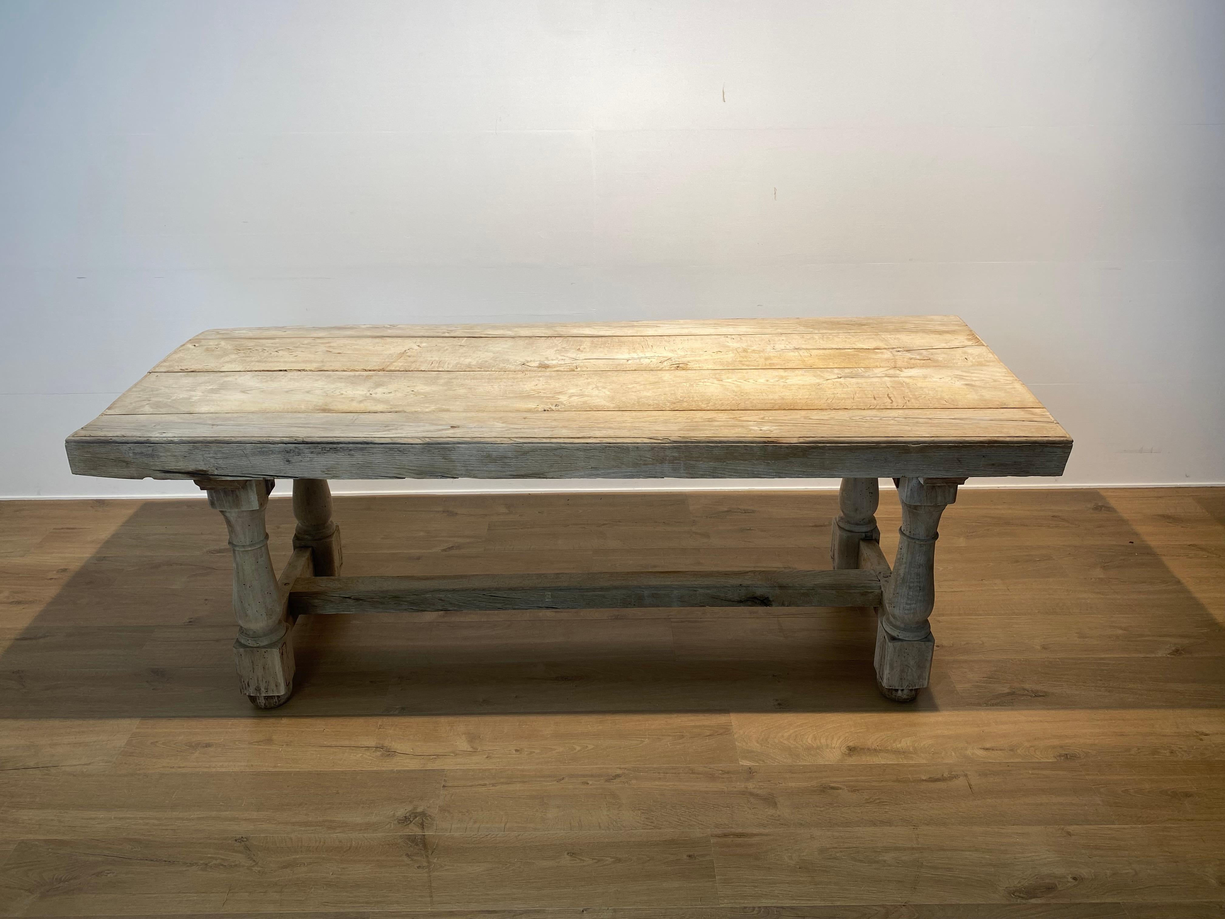 Brutalist French antique Center Table from a kitchen,
from around 1790 in a bleached Oak,
nice patina and shine of the bleached Oak,
the table top is 9 cm thick