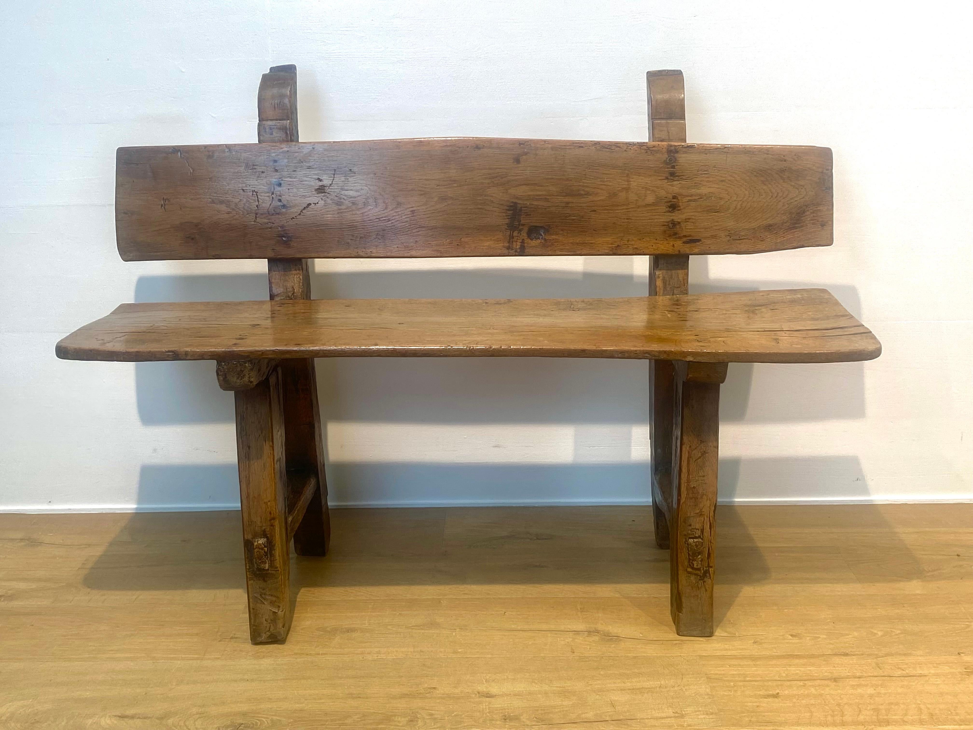 An elegant,brutalist Catalan Spanish Bench,
good and warm patina of the blond Chestnut Wood,
good condition and comfortable seating, simple but strong design,
can be used for different purposes