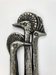 Brutalist art piece "three peacocks", typically 1960's