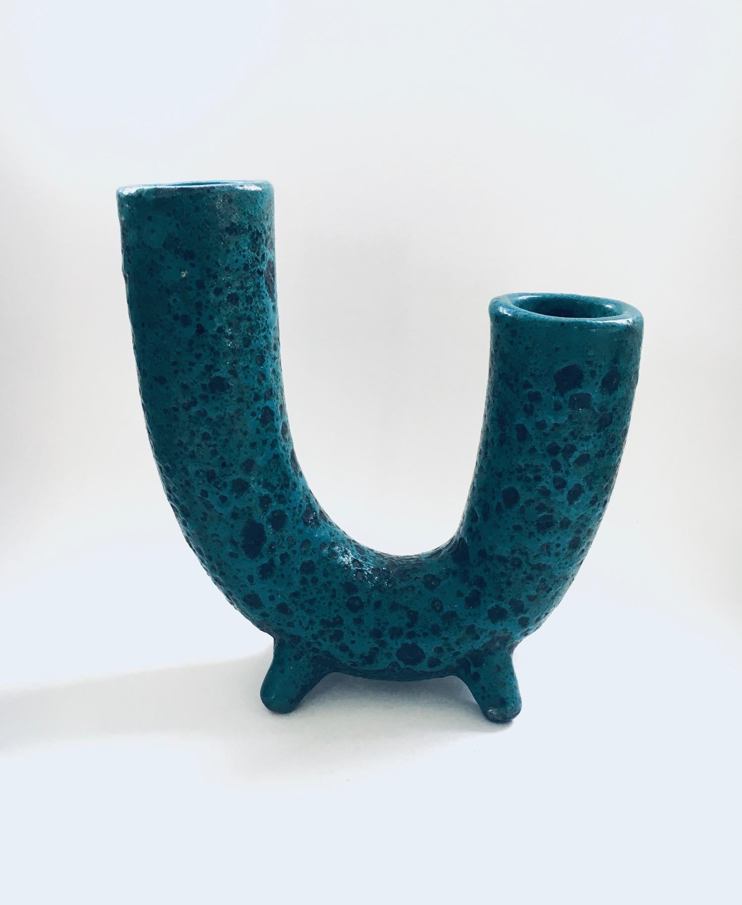 Vintage Midcentury Brutalist in Design Art Pottery Studio Horn Spout model Fat Lava Vase. Made in Belgium, 1960's period. Turquoise blue fat lava glaze over black mat glaze. No markings. Cool shape, in very good condition. Measures 29cm x 26cm x