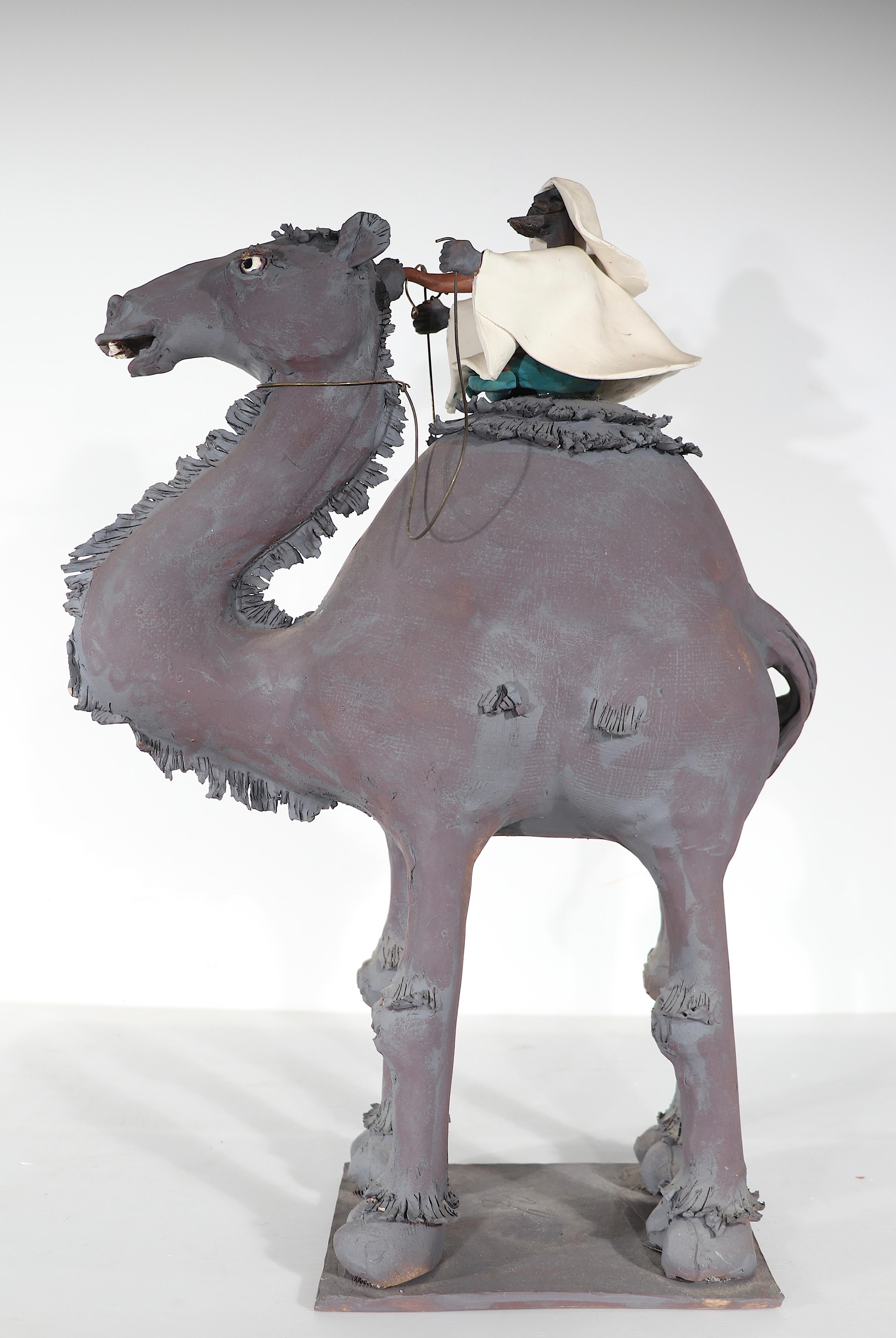 Brutalist Art Pottery Studio  Sculpture Man with Gun Riding a Camel signed  In Good Condition For Sale In New York, NY